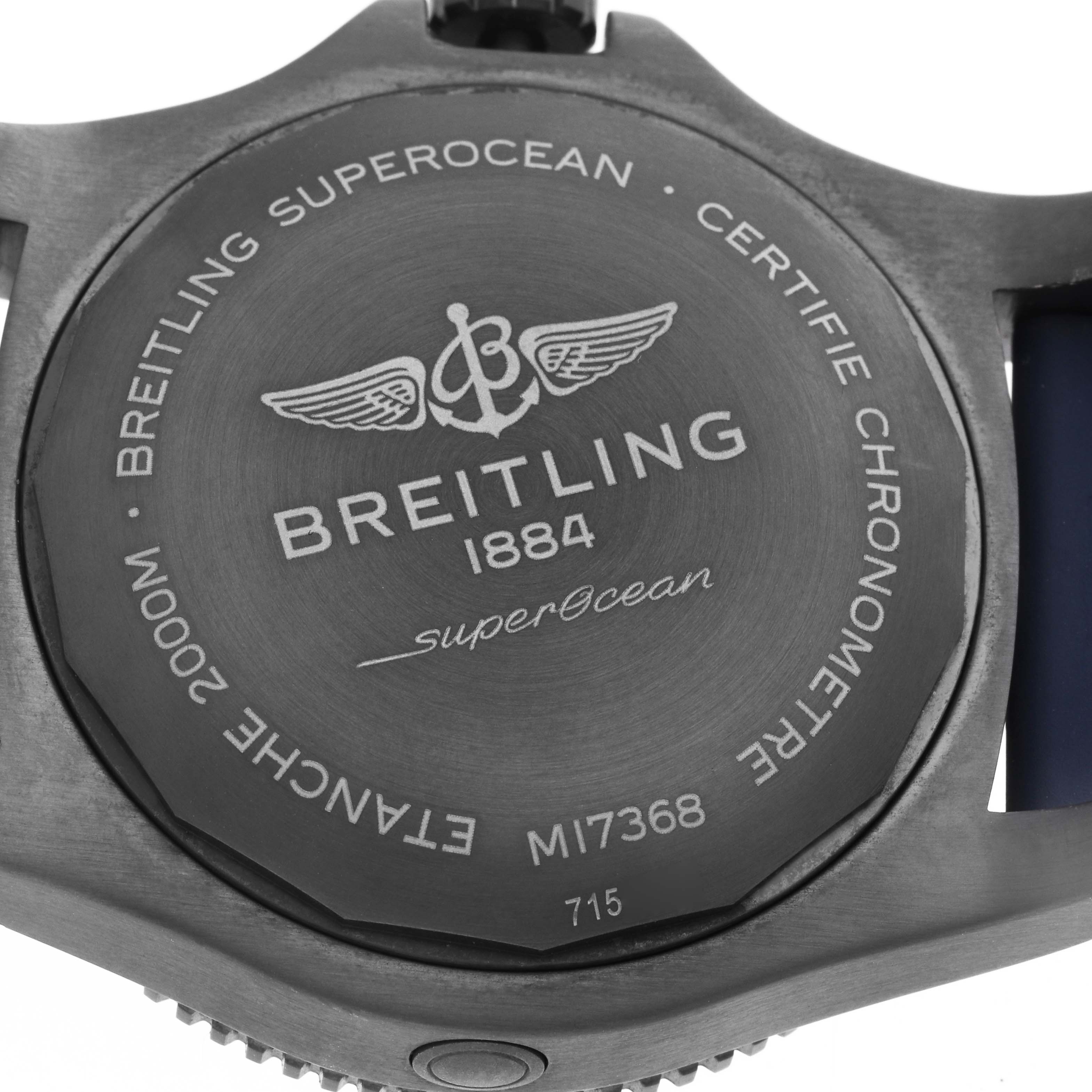 The image shows the back case of the Breitling Superocean M17368 Men's Stainless Steel Blue Dial watch, highlighting branding and specifications.