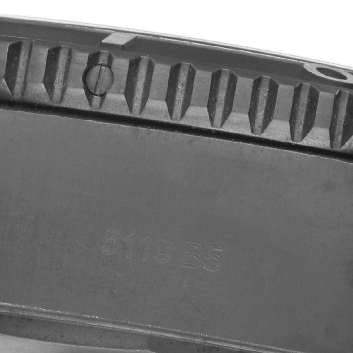 The image shows a close-up of the side view of the bezel on a Breitling Superocean M17368 Men's Stainless Steel Blue Dial watch.