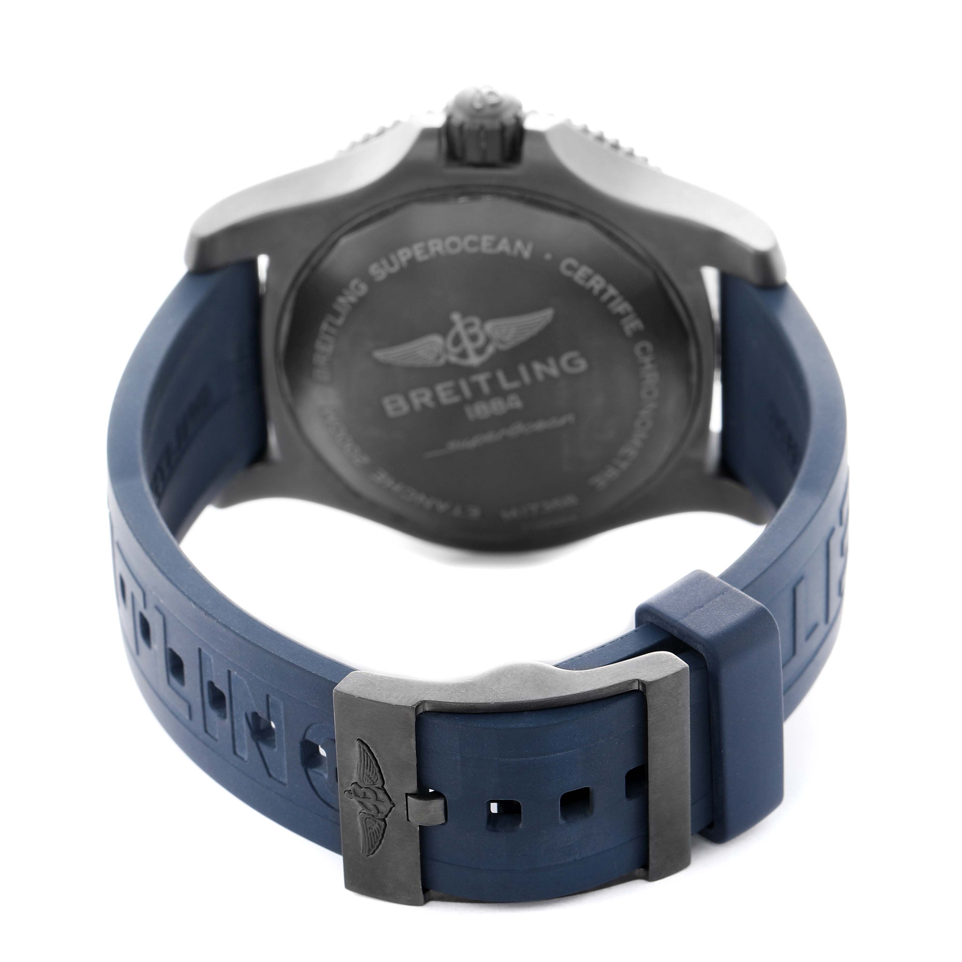 The image shows the back of the Breitling Superocean M17368 Men's Stainless Steel Blue Dial watch, highlighting the case back and blue rubber strap with a clasp.