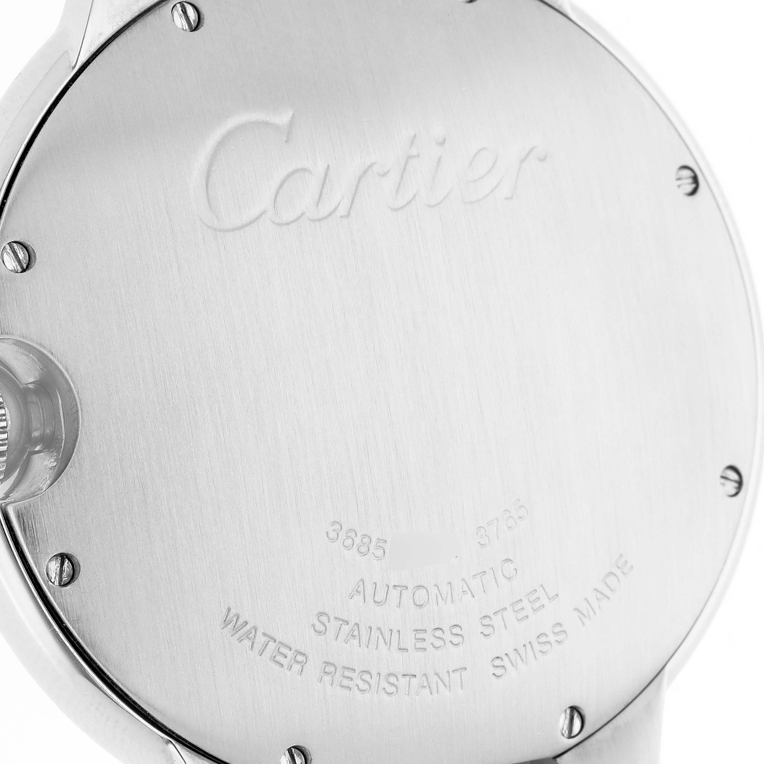 The image shows the back case of a Cartier Ballon Bleu W6920042 Men's Stainless Steel Black Dial watch, highlighting the engravings and screws.