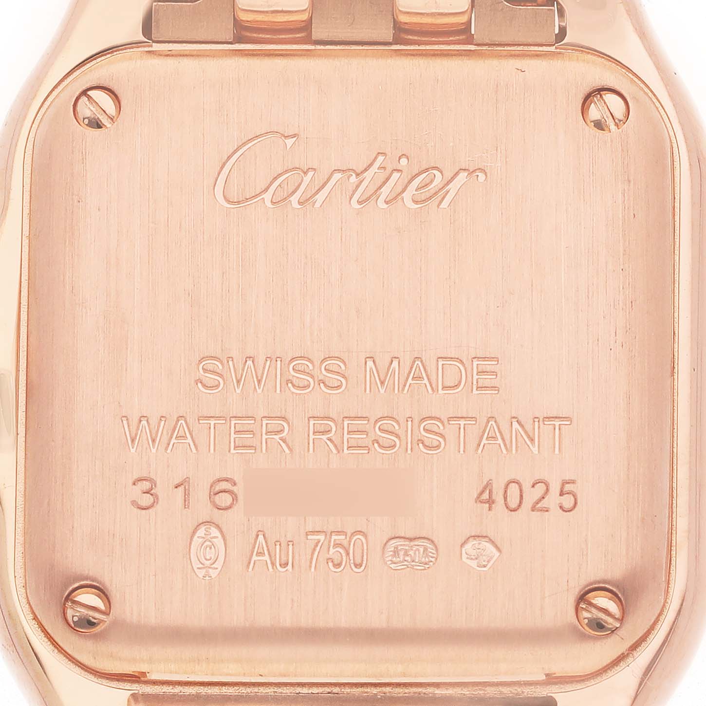The image shows the back case of a Cartier Panthere WGPN0006 Women's Rose Gold Silver Dial WGPN0006 Women's Rose Gold Silver Dial watch, highlighting brand engravings and specifications.