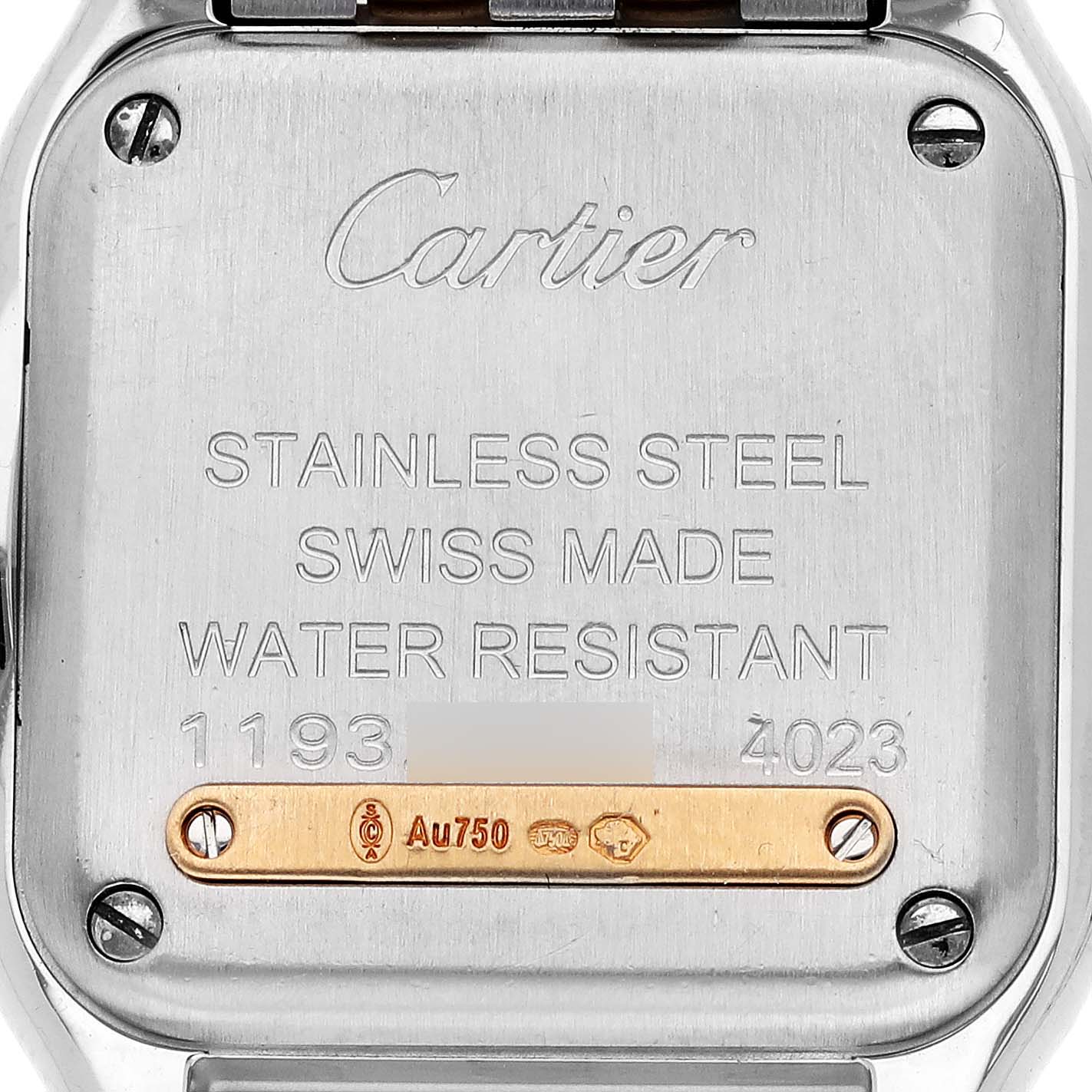 The image shows the back of the Cartier Panthère watch, highlighting its inscriptions and metal details.