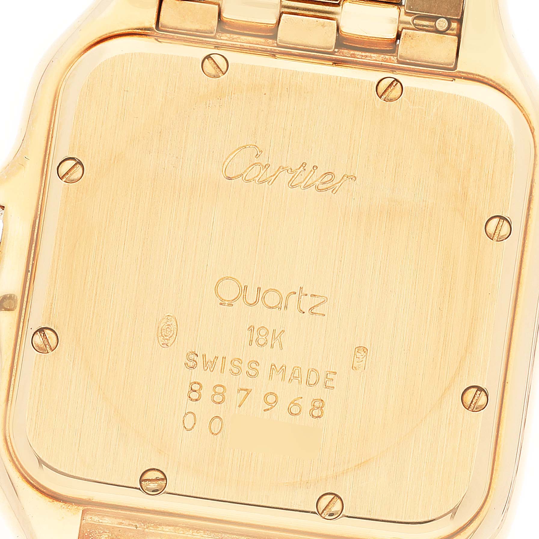 The image shows the back case of the Panthère de Cartier watch with brand markings and model information.