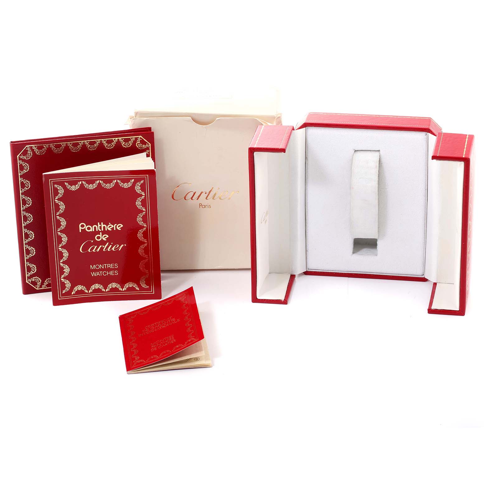 The image shows the packaging, booklets, and an empty display box for the Panthere de Cartier watch.