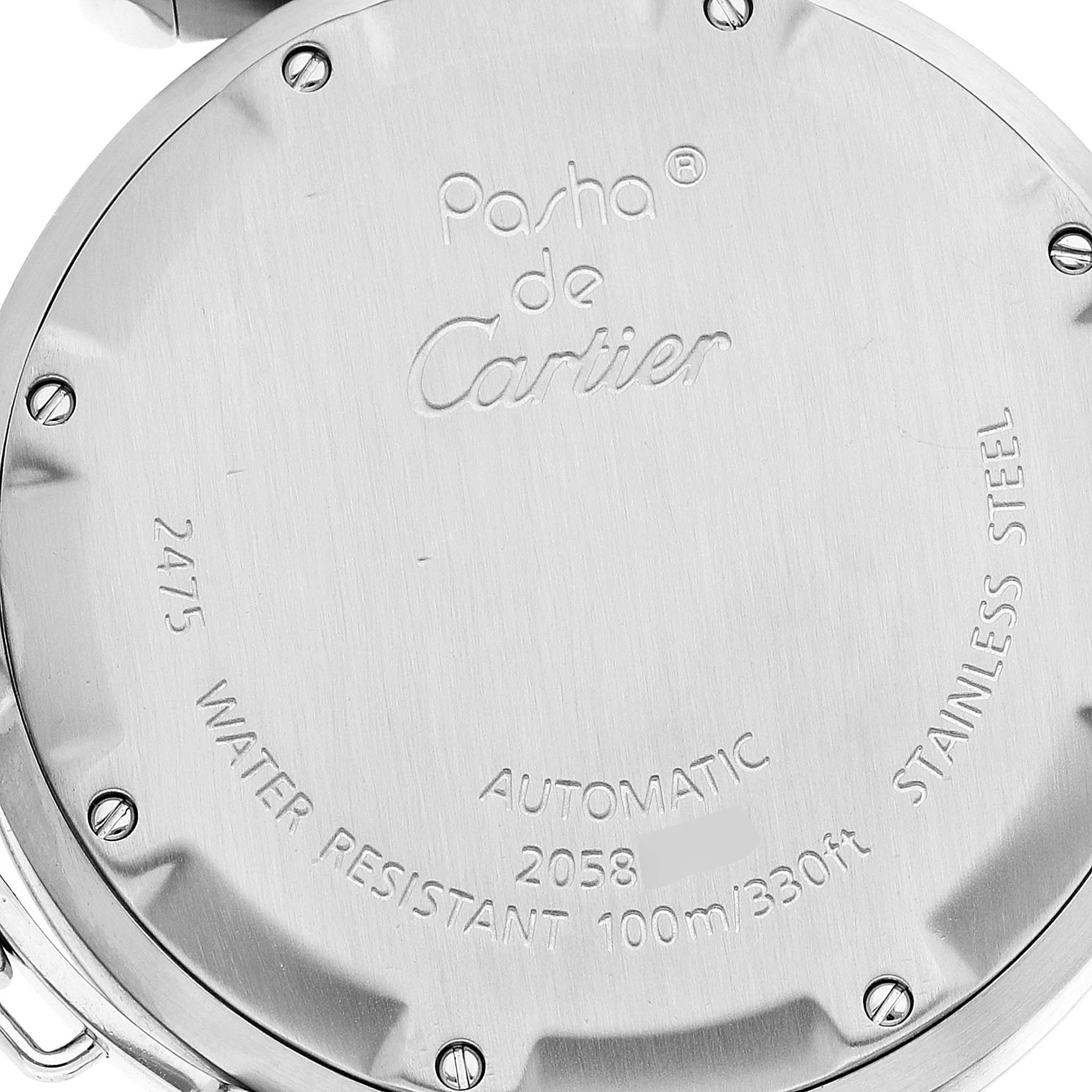 The image shows the back case of a Pasha de Cartier watch, highlighting brand engraving and specifications.