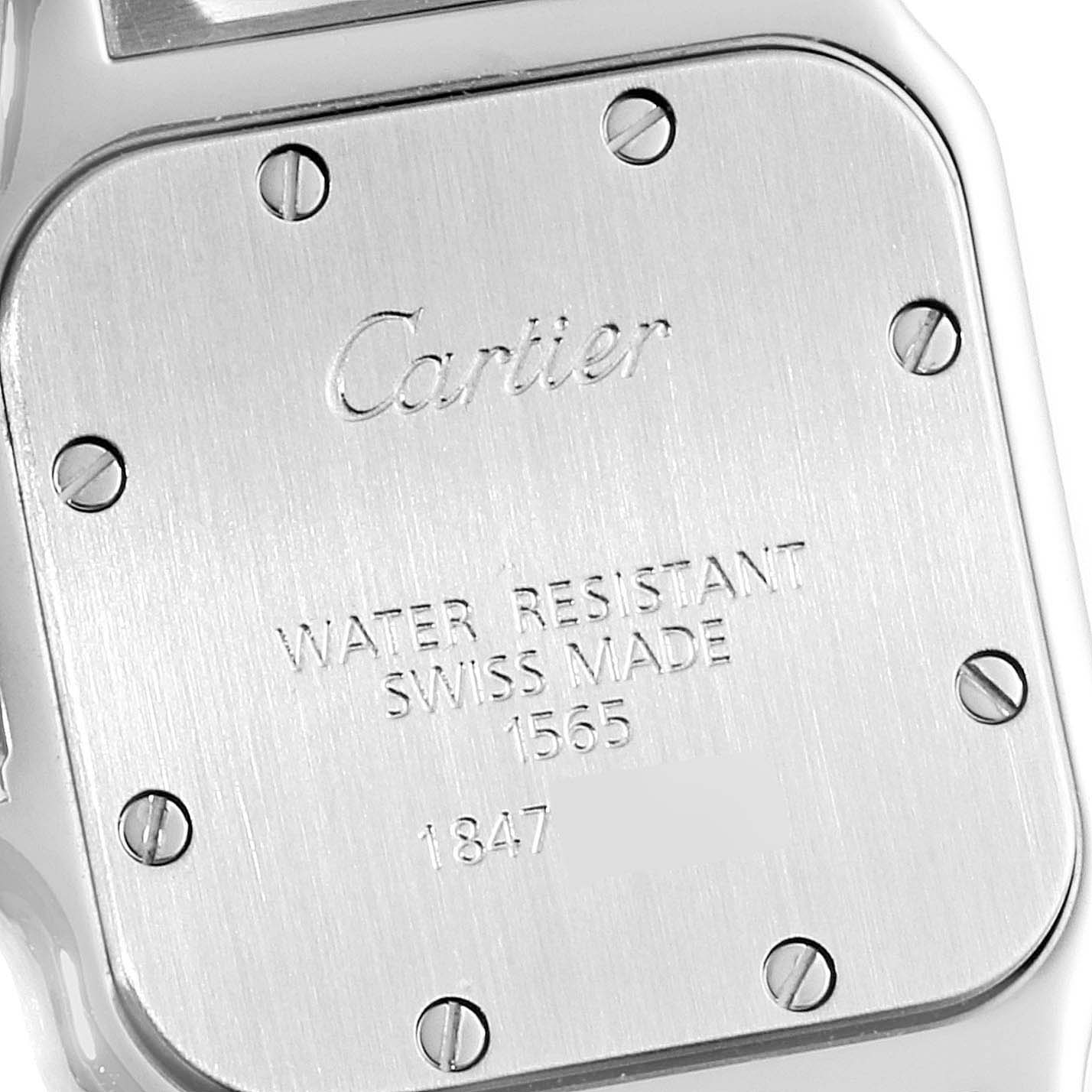 This image shows the back case of the Santos watch by Cartier, including the brand's engraving and water resistance details.