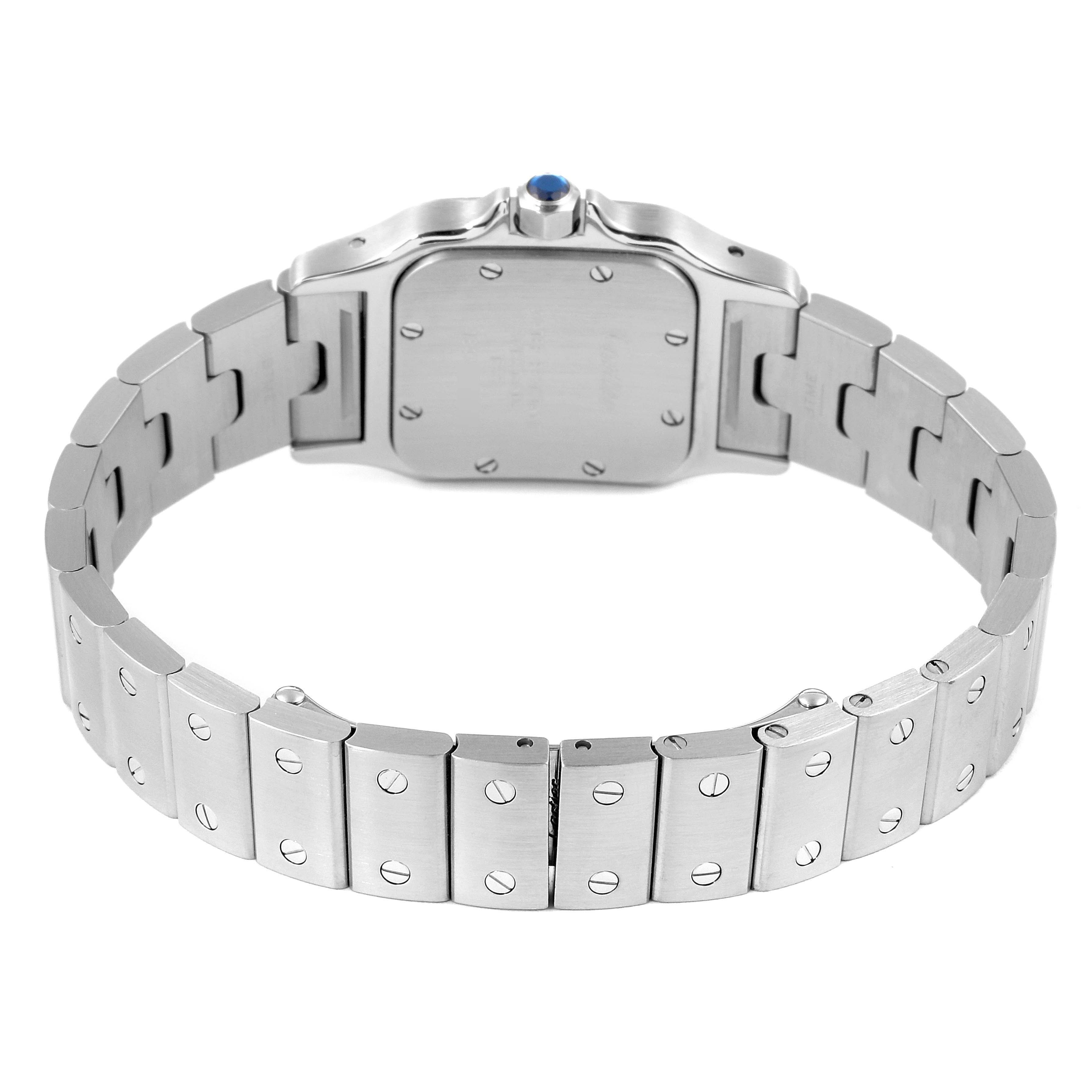 The Cartier Santos W20056D6 Women's Stainless Steel Silver Dial W20056D6 Women's Stainless Steel Silver Dial watch is shown from the back, highlighting its case back and stainless steel bracelet with screw details.