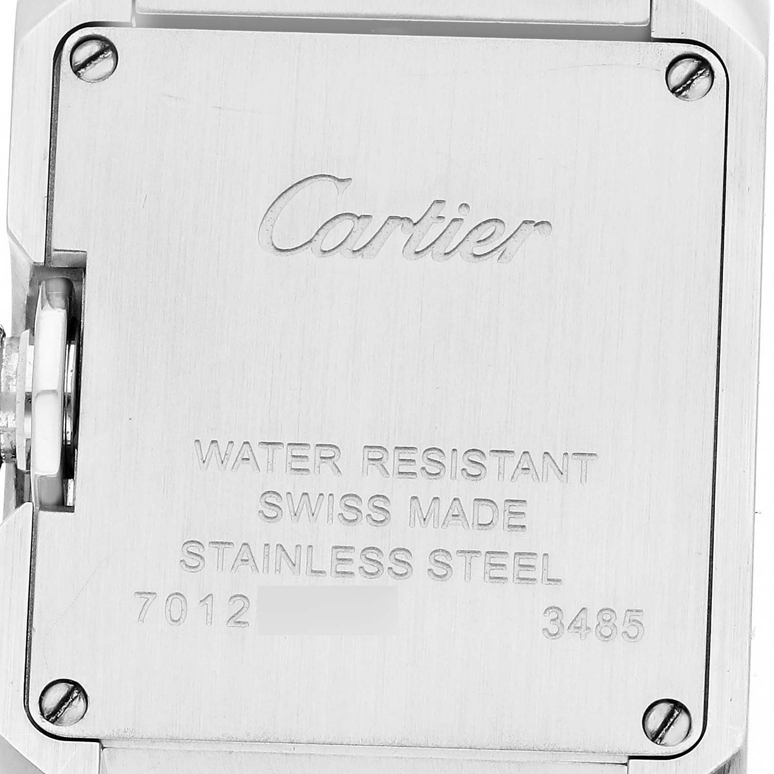 This image shows the back of the Cartier Tank Anglaise W5310022 Women's Stainless Steel Silver Dial watch, highlighting its stainless steel casing and engravings.