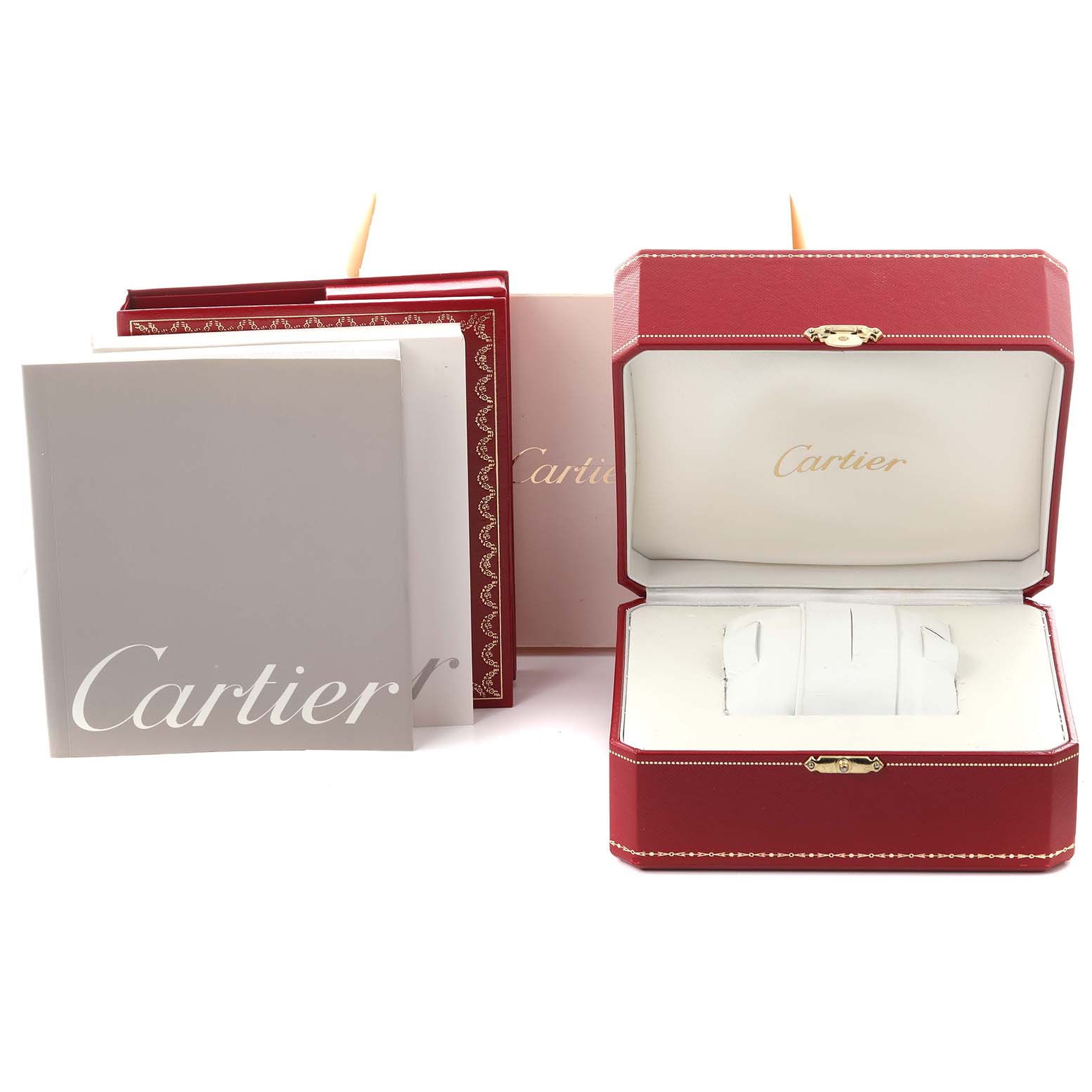 The image shows the Cartier Tank Française packaging, including a red box and accompanying booklets.