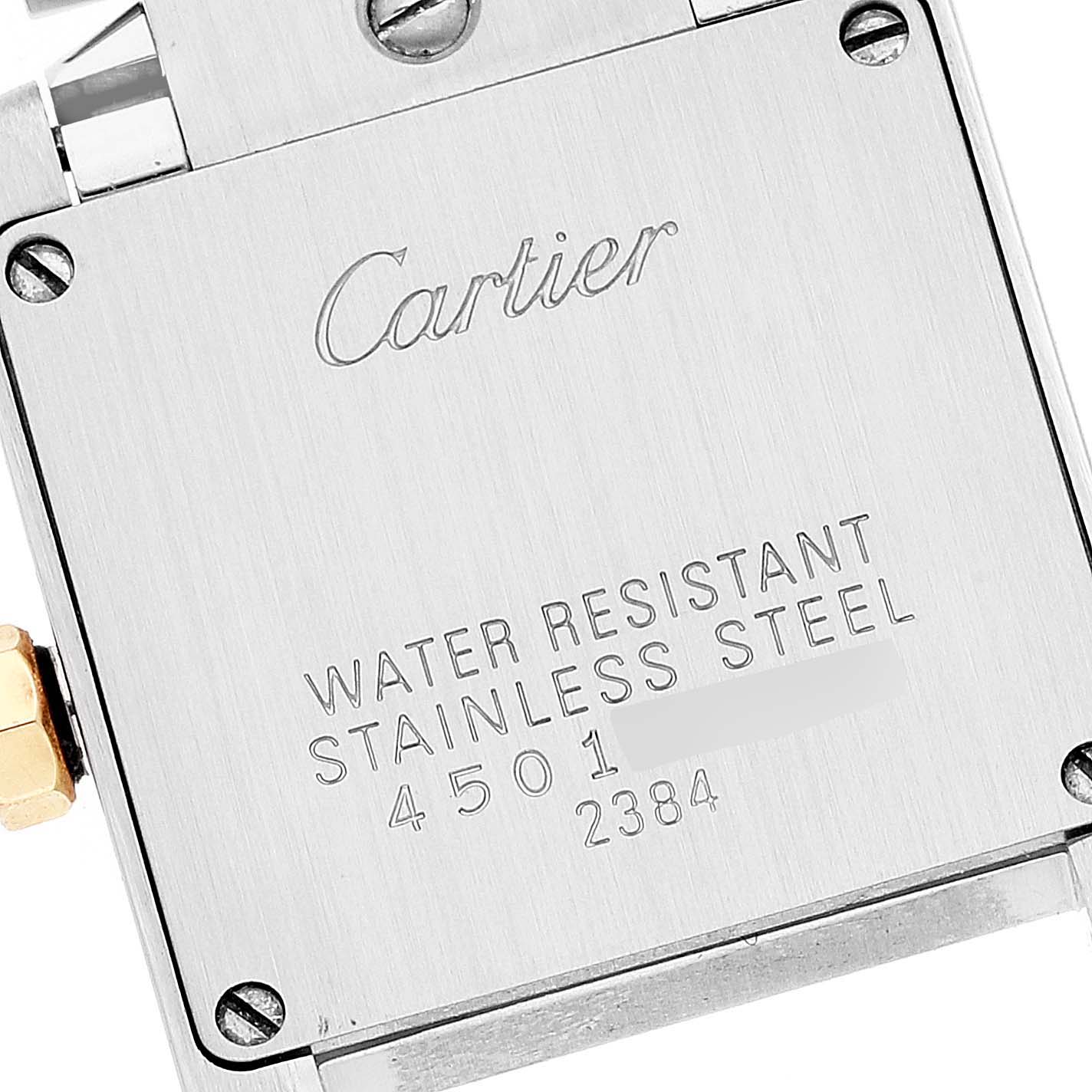 This image shows the stainless steel back case of a Cartier Tank Française watch, displaying the brand name and water resistance details.