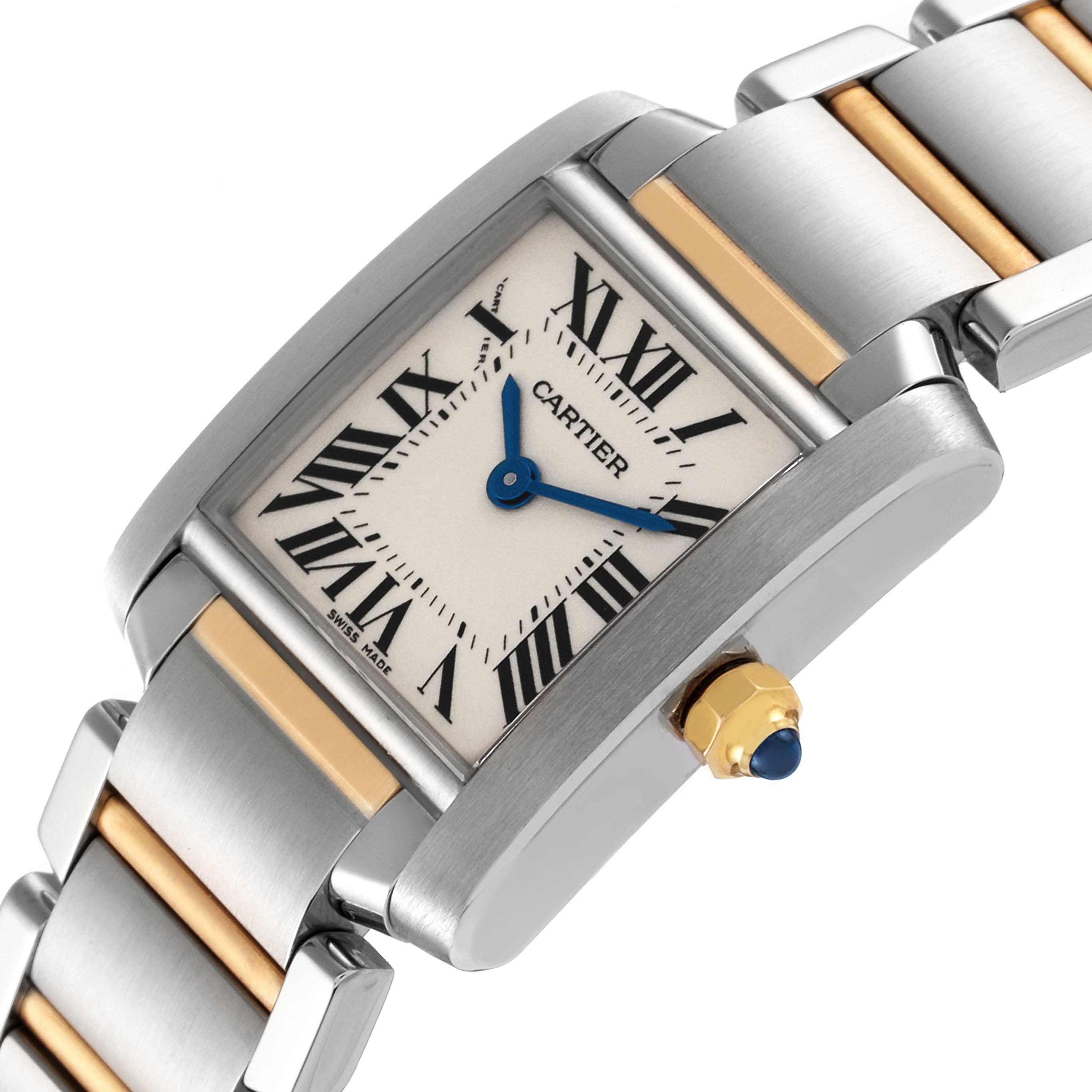 The image shows a Cartier Tank Française watch at an angle highlighting the face, crown, and two-tone bracelet.