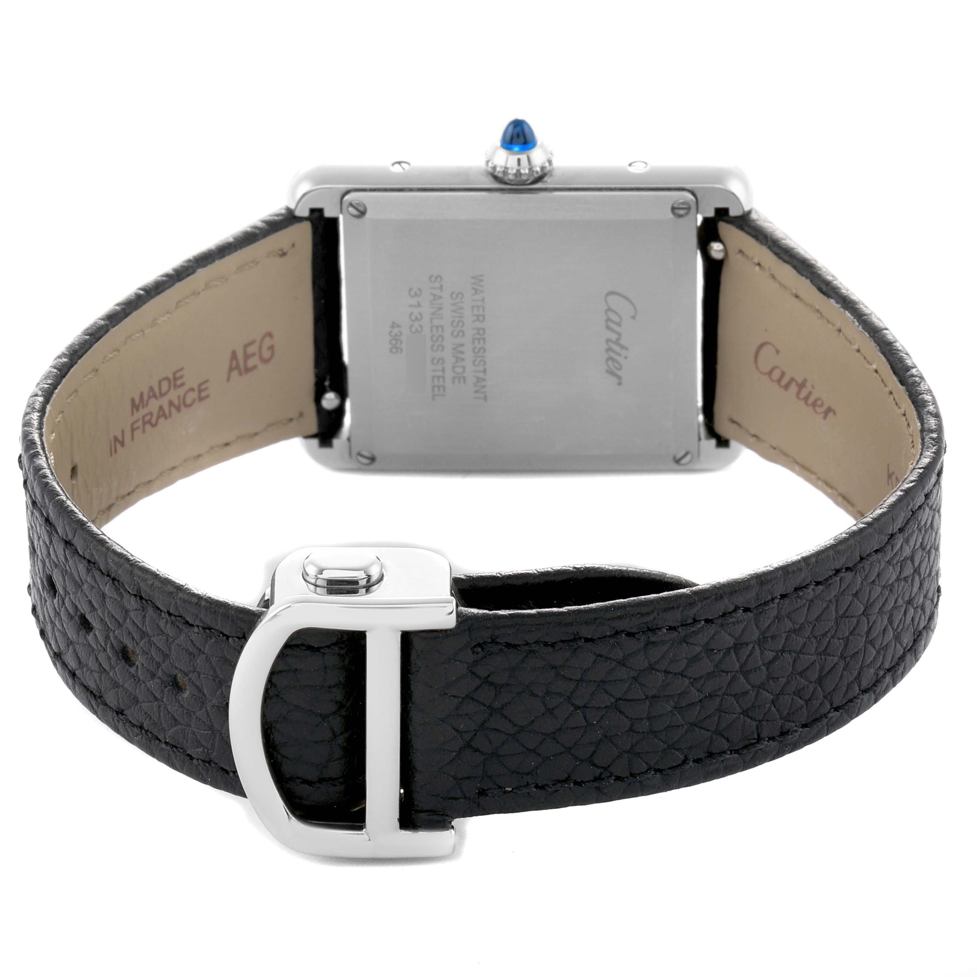 The Cartier Tank Must WSTA0059 Women's Stainless Steel Silver Dial watch is shown from the back, highlighting the case back, crown, and leather strap.