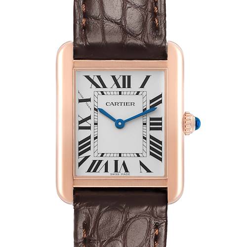 The Cartier Tank Solo W5200024 Women's Rose Gold Silver Dial watch is shown from the front, displaying its face, Roman numerals, blue hands, and brown leather strap.