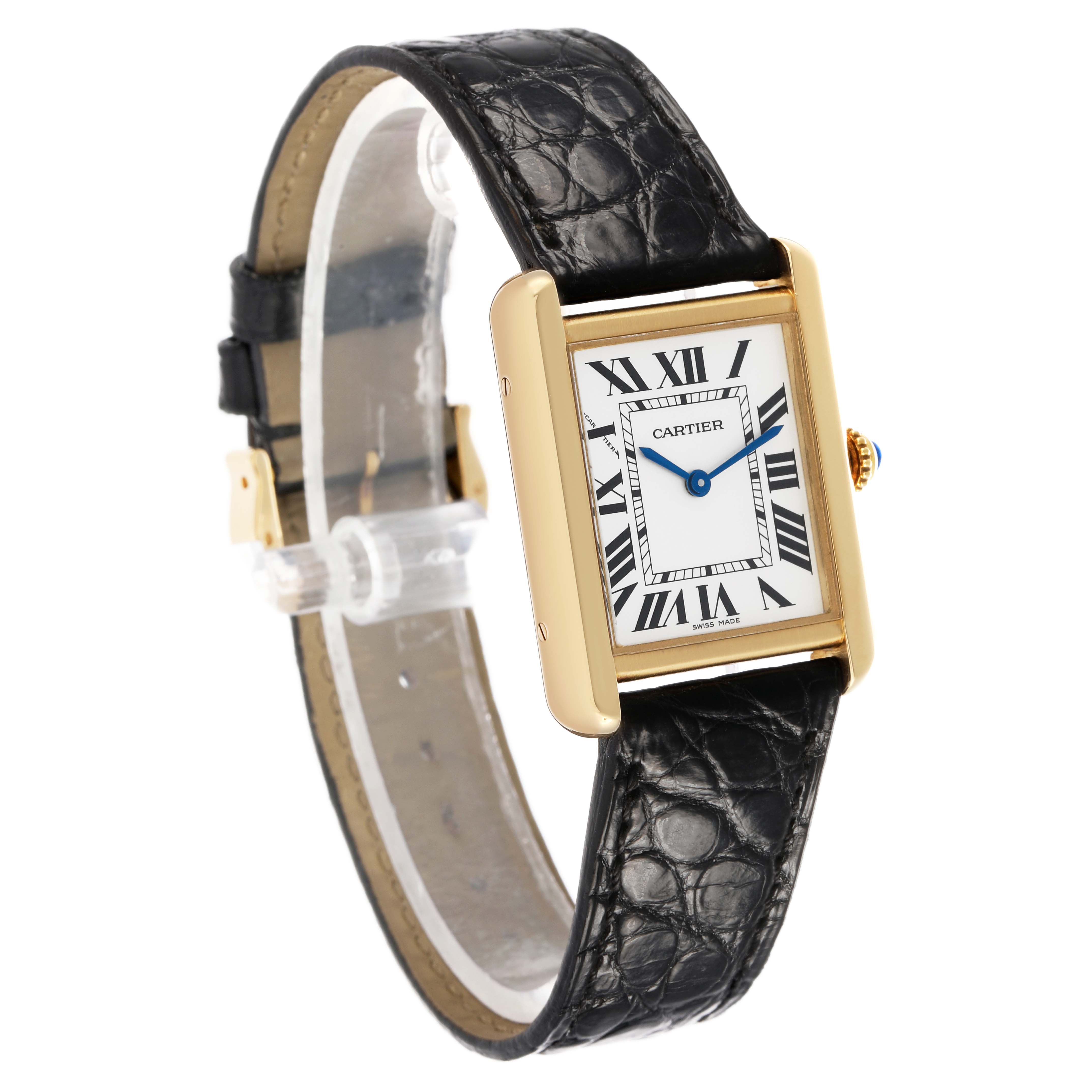 The Cartier Tank Solo W5200002 Women's Yellow Gold Silver Dial watch is shown at a slight angle highlighting the gold case, white Roman numeral dial, and black leather strap.
