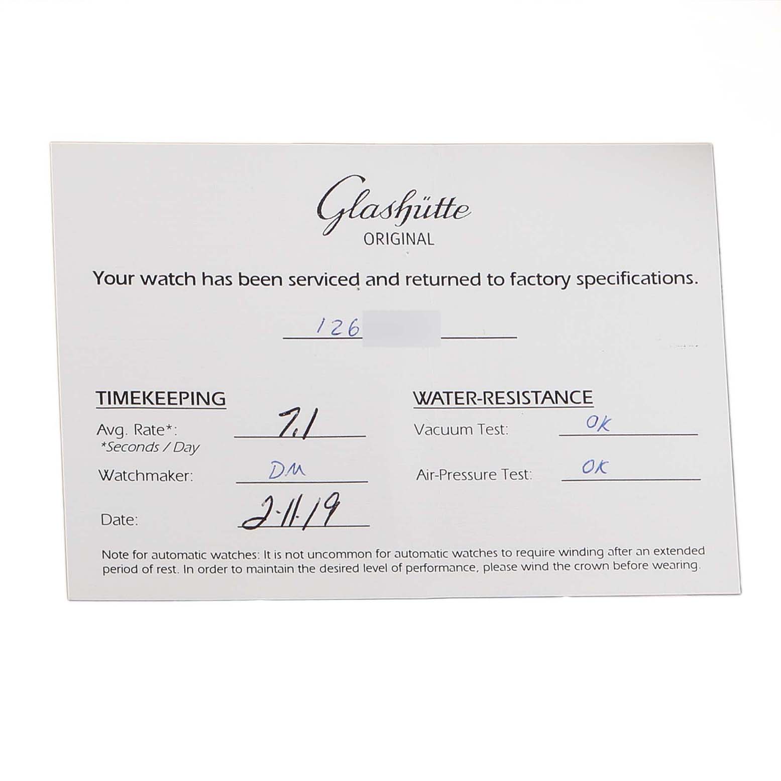The image shows a service card from Glashütte Original, detailing timekeeping and water-resistance tests.