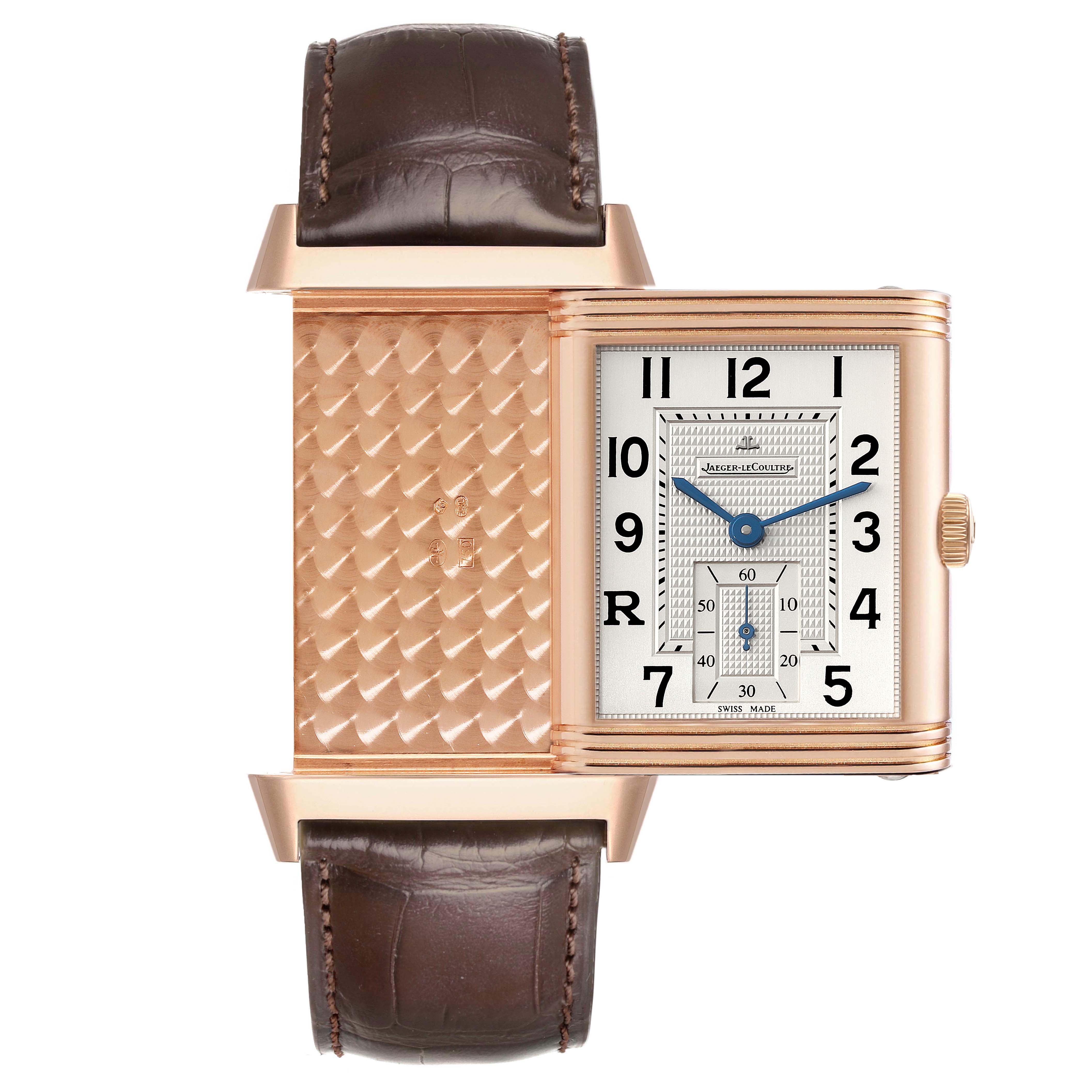 The Jaeger LeCoultre Reverso Q3732420 Men's Rose Gold Silver Dial watch is shown partly reversed, displaying its decorated case back alongside the dial.