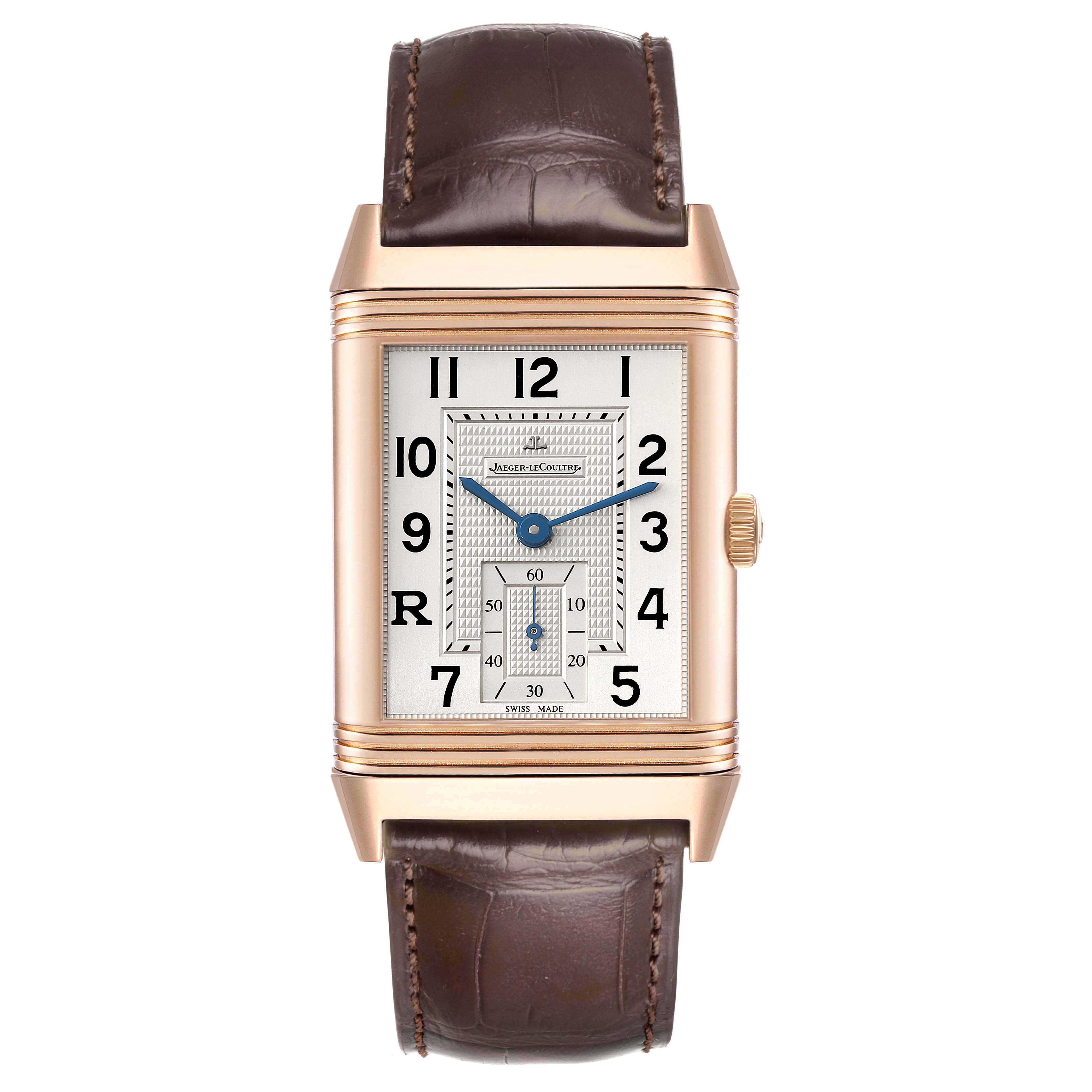 The image shows a front view of the Jaeger-LeCoultre Reverso watch, highlighting its face, case, crown, and leather strap.