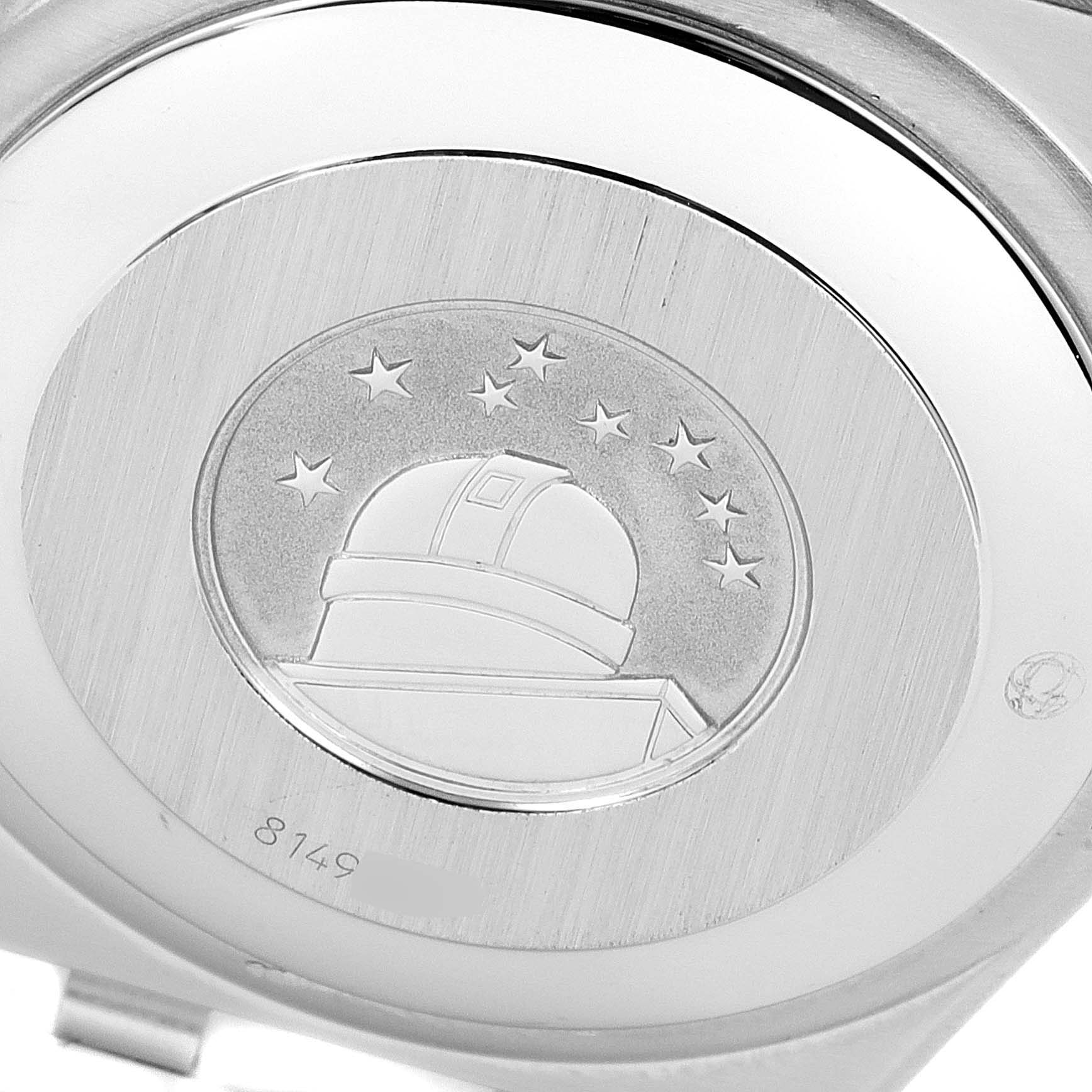 The image shows the case back of the Omega Constellation 1202.30.00 Men's Steel and Gold (two tone) Silver Dial 1202.30.00 Men's Steel and Gold (two tone) Silver Dial watch, featuring an engraving of an observatory and stars.