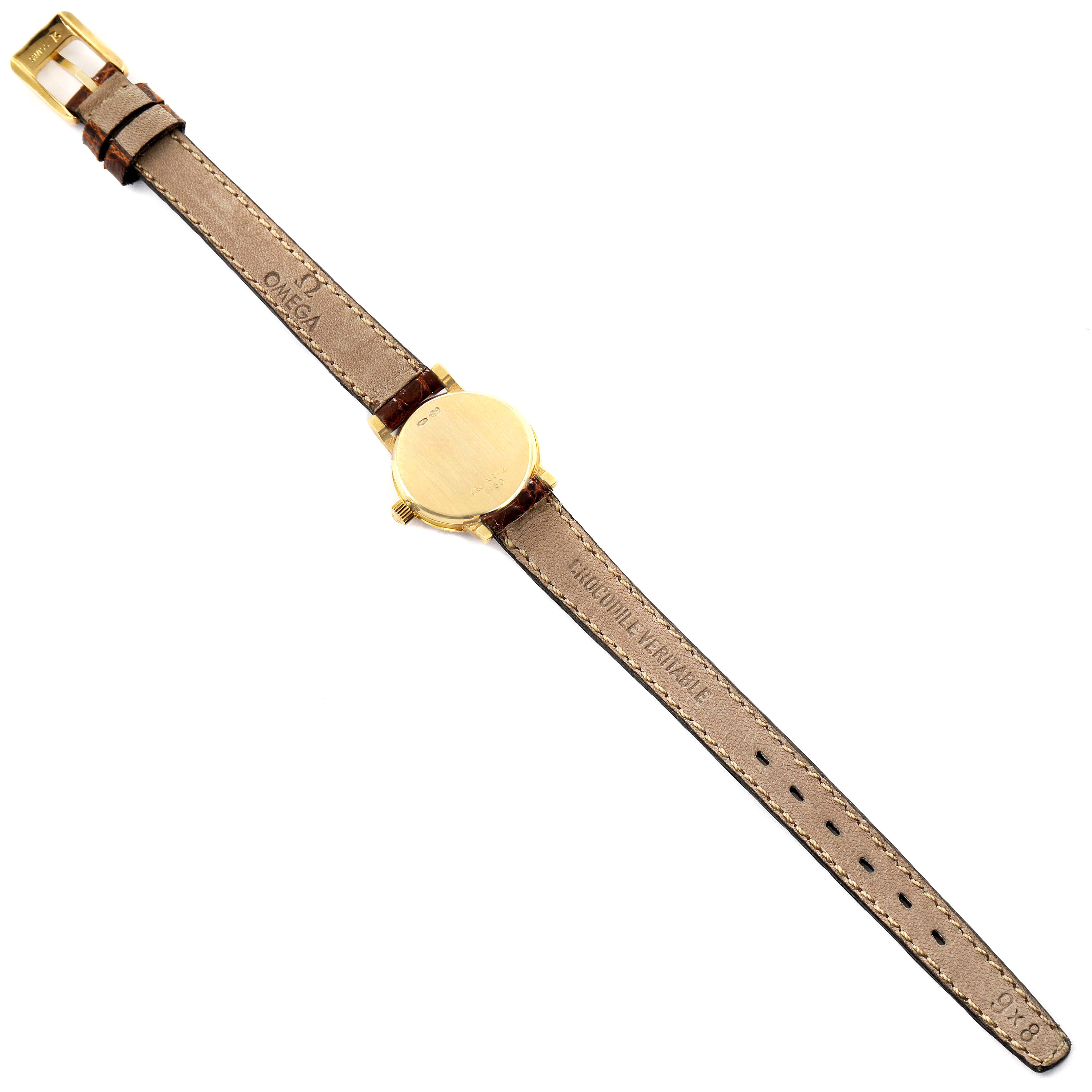 The Omega 1450 Women's Yellow Gold Champagne Dial 1450 Women's Yellow Gold Champagne Dial DeVille Mini Yellow Gold Diamond Cocktail Ladies Watch 1450 Unworn model is shown from the back, highlighting the strap and case back.