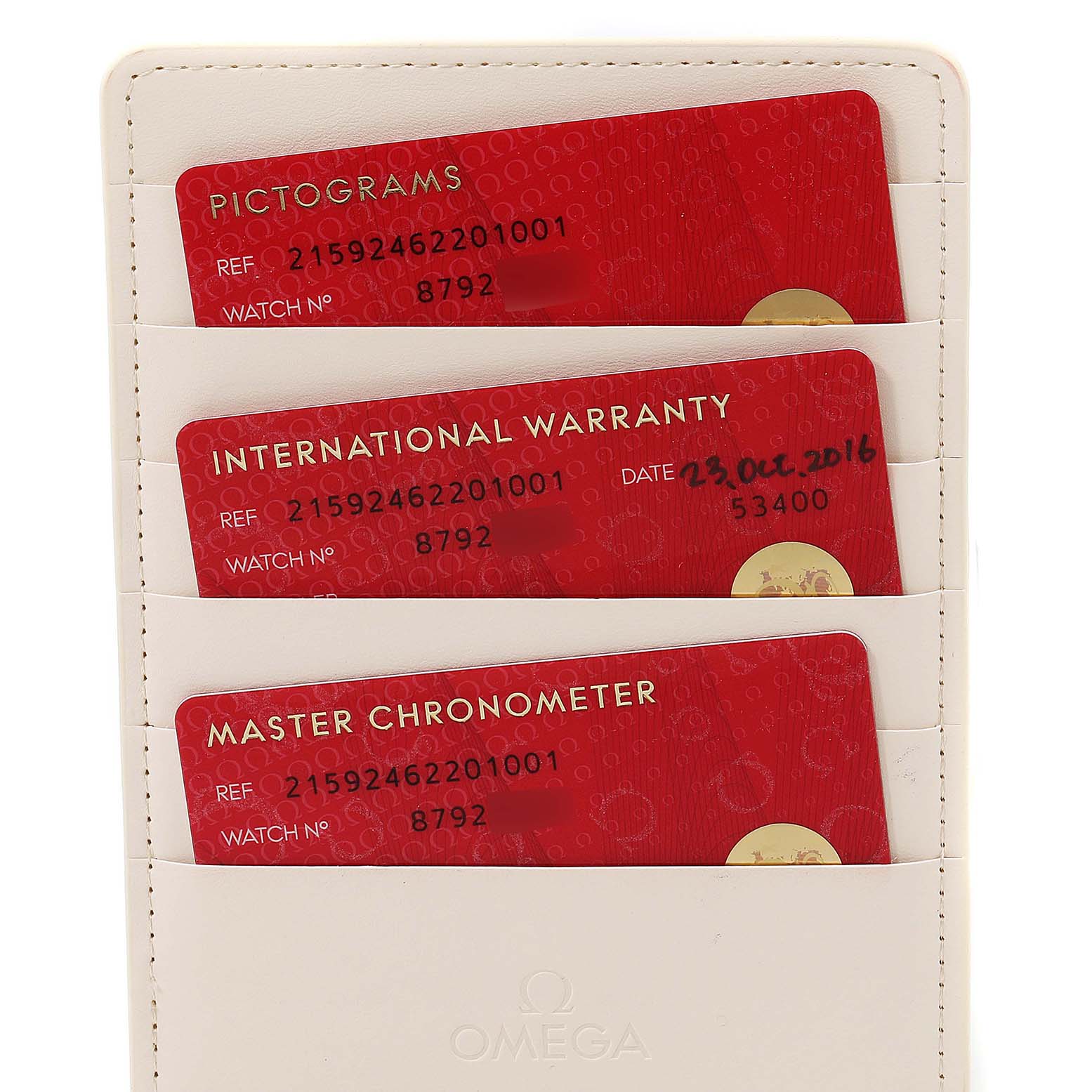 The image shows the warranty and certification cards for the Omega Planet Ocean 215.92.46.22.01.001 Men's Stainless Steel Black Dial 215.92.46.22.01.001 Men's Stainless Steel Black Dial model.