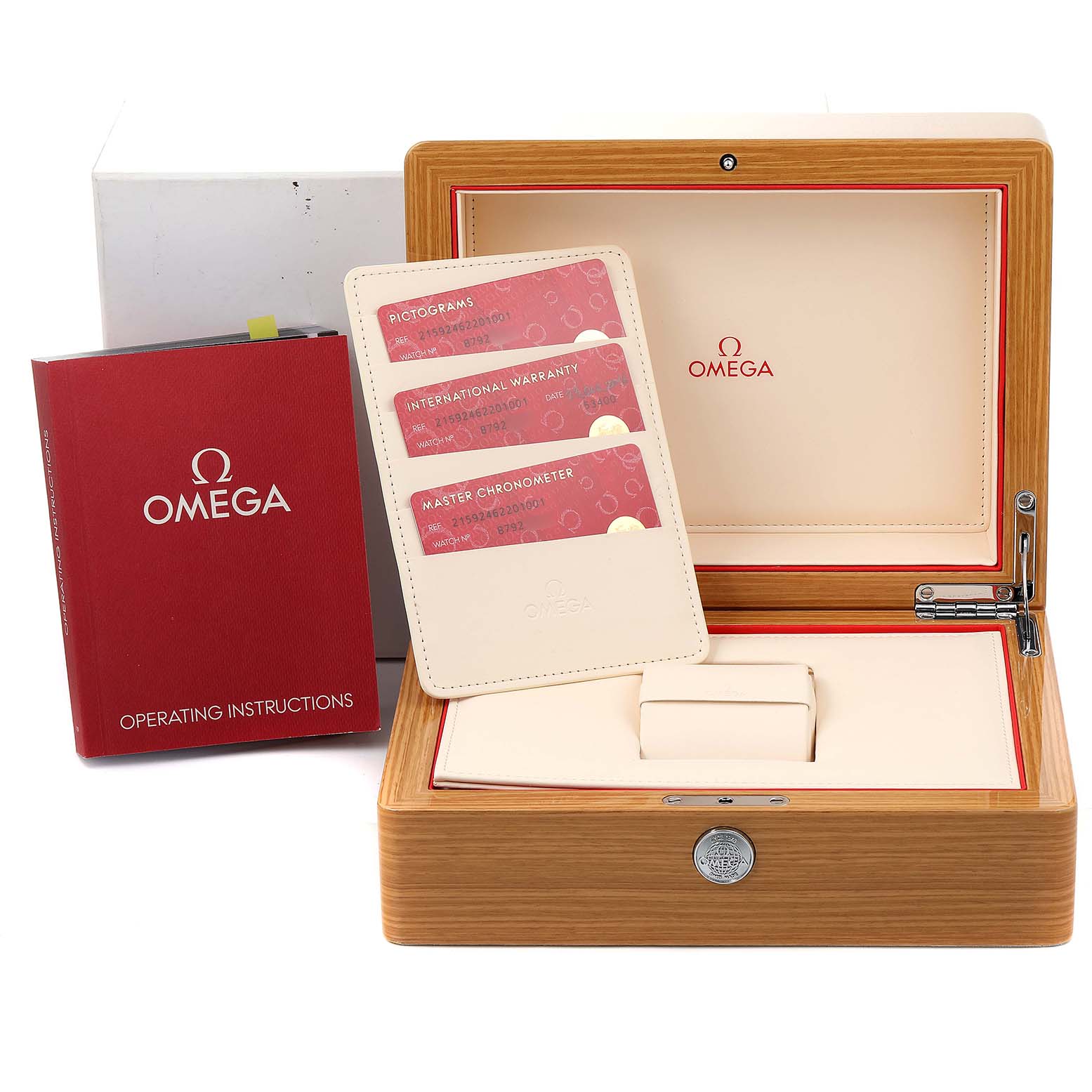 The image shows an Omega Planet Ocean 215.92.46.22.01.001 Men's Stainless Steel Black Dial 215.92.46.22.01.001 Men's Stainless Steel Black Dial watch box, warranty cards, and an operating instructions booklet from a frontal angle.