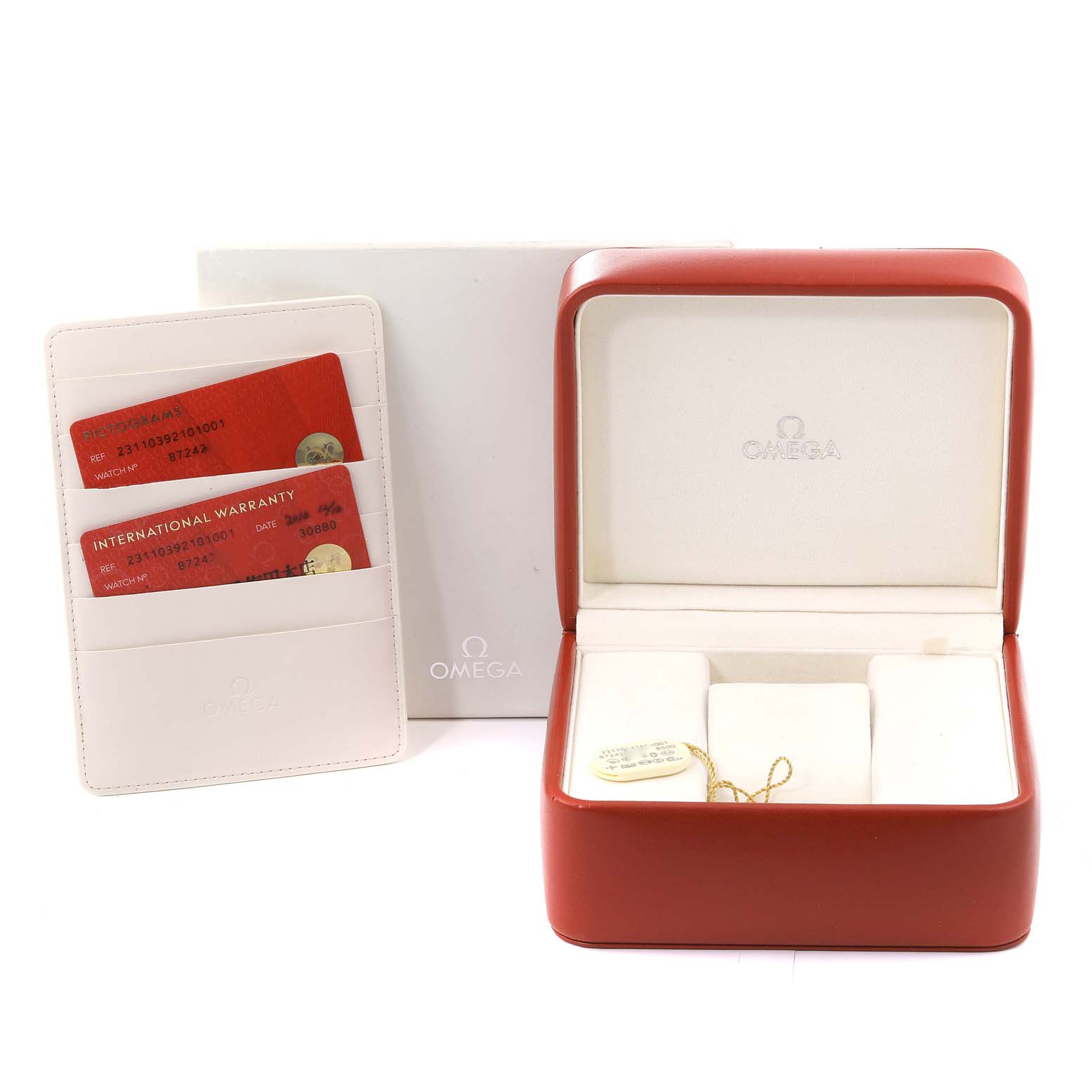 This image shows the box, warranty cards, and holder for the Omega Aqua Terra 231.10.39.21.01.001 Men's Stainless Steel Black Dial 231.10.39.21.01.001 Men's Stainless Steel Black Dial model watch.