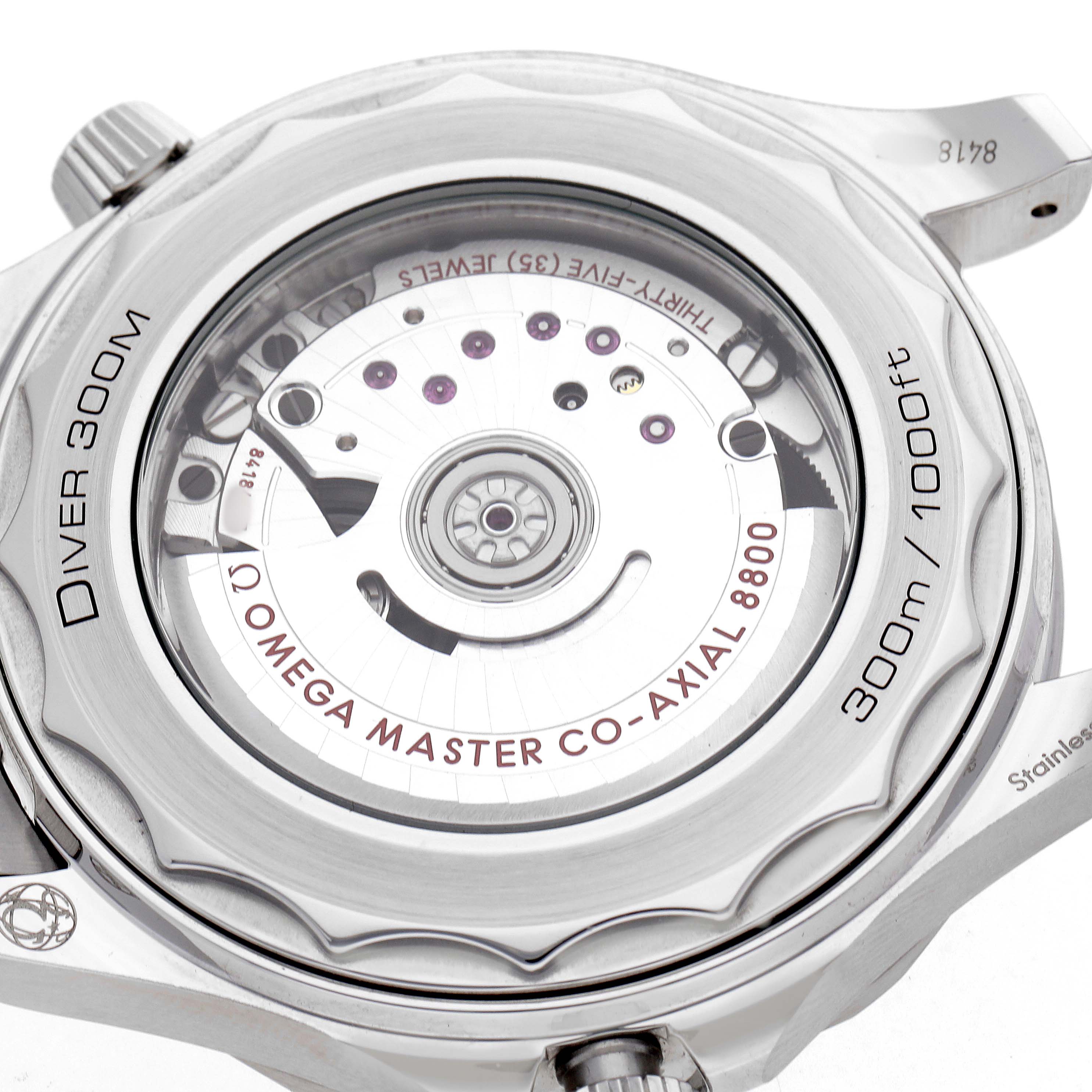 The image shows the back view of an Omega Seamaster 210.30.42.20.10.001 Men's Stainless Steel Green Dial, highlighting the movement and caseback details.