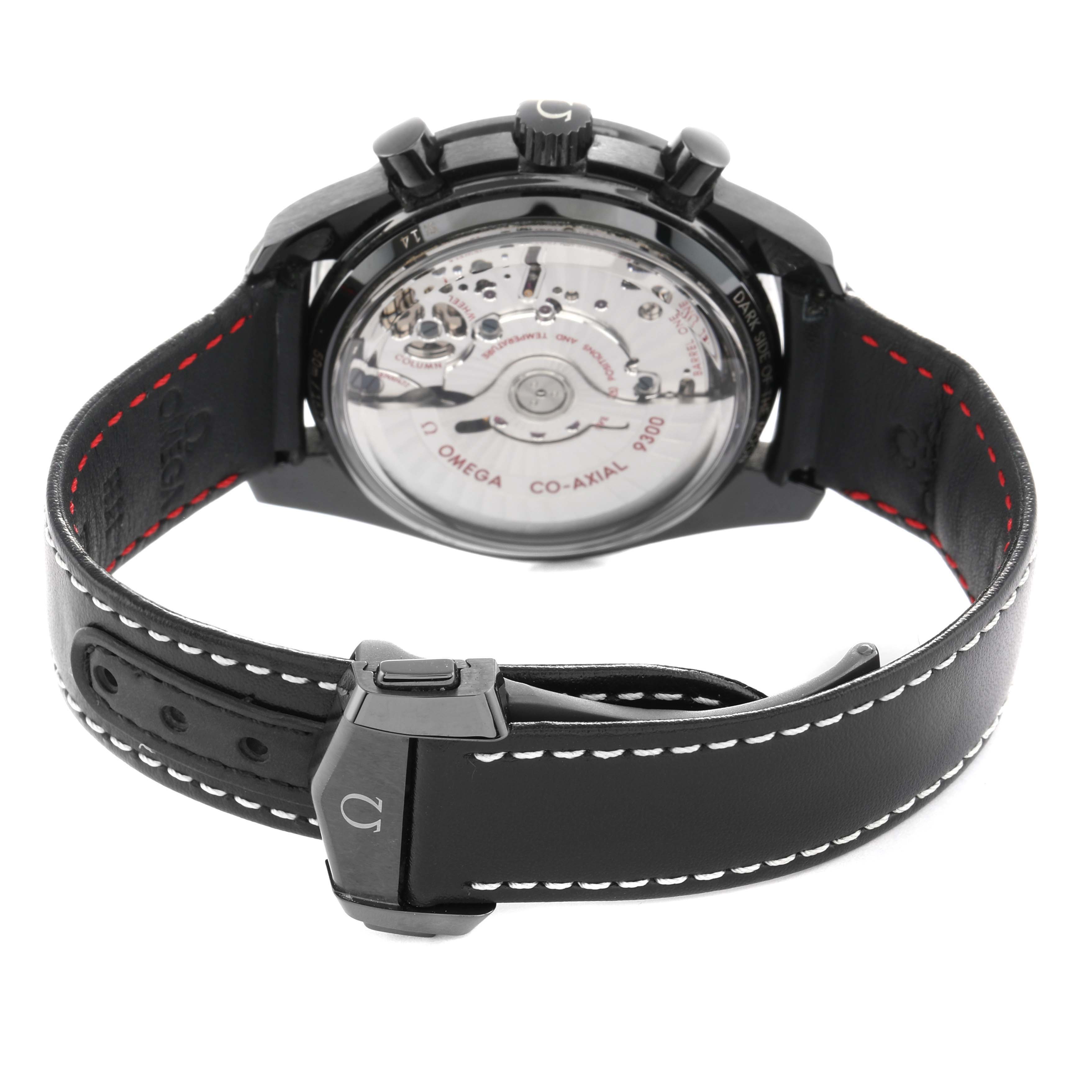 The image shows the back of the Omega Speedmaster O311.92.44.51.01.003 Men's Ceramic Black Dial watch, highlighting the transparent case and movement.