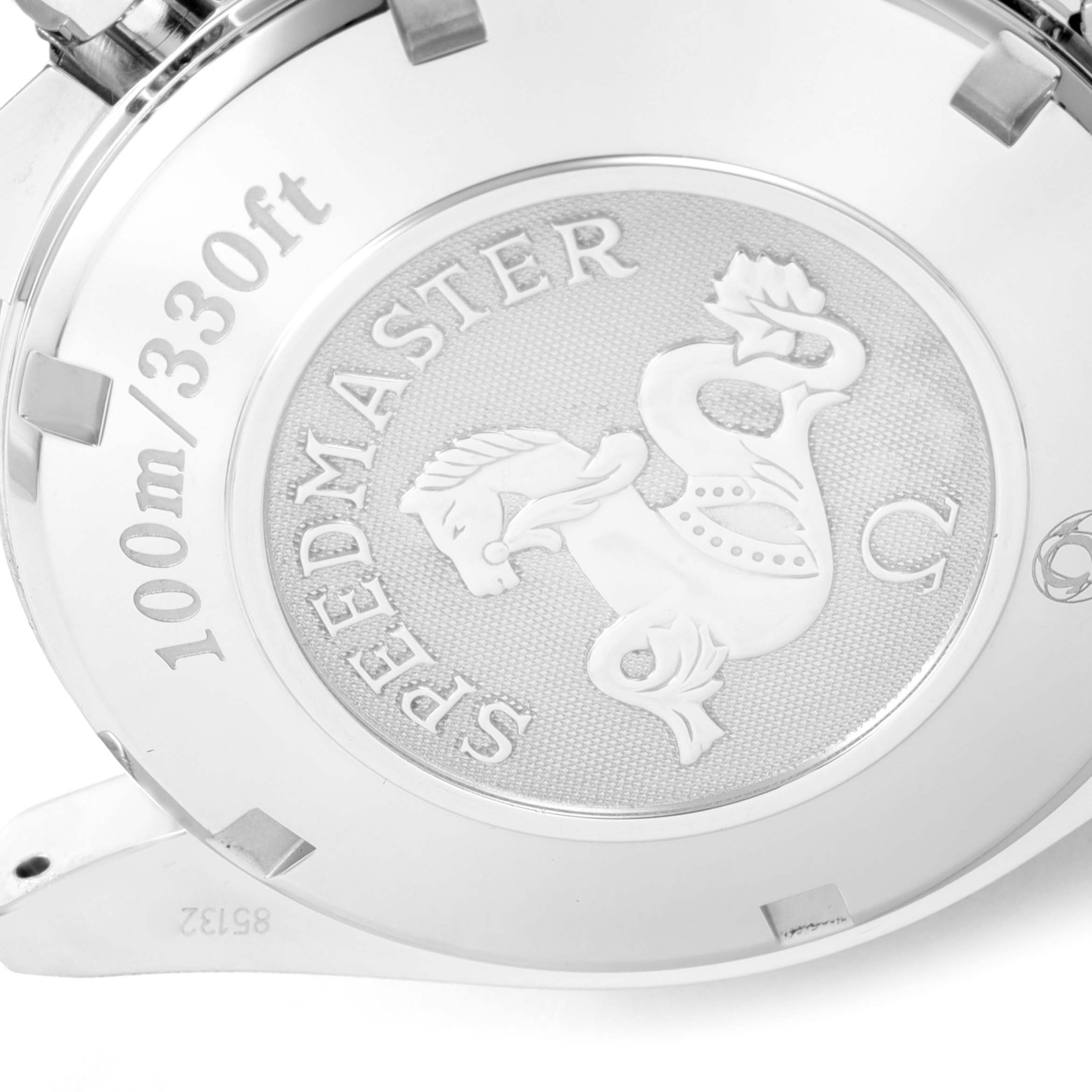 The image shows the back of an Omega Speedmaster 323.30.40.40.04.001 Men's Stainless Steel White Dial 323.30.40.40.04.001 Men's Stainless Steel White Dial watch engraved with "Speedmaster" and "100m/330ft."