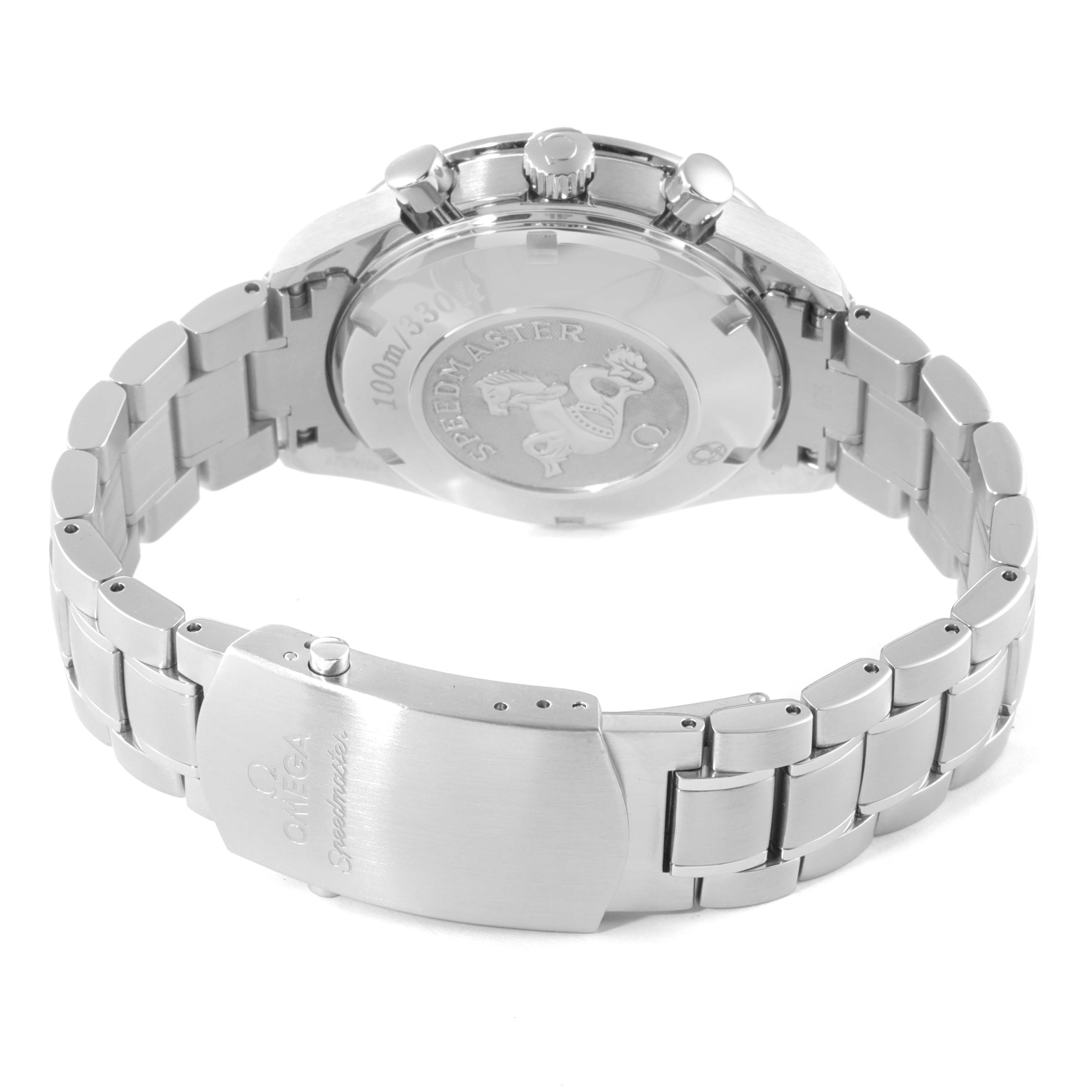 The image shows the backside and clasp of the Omega Speedmaster 323.30.40.40.04.001 Men's Stainless Steel White Dial 323.30.40.40.04.001 Men's Stainless Steel White Dial watch, highlighting its engraving and stainless steel bracelet.