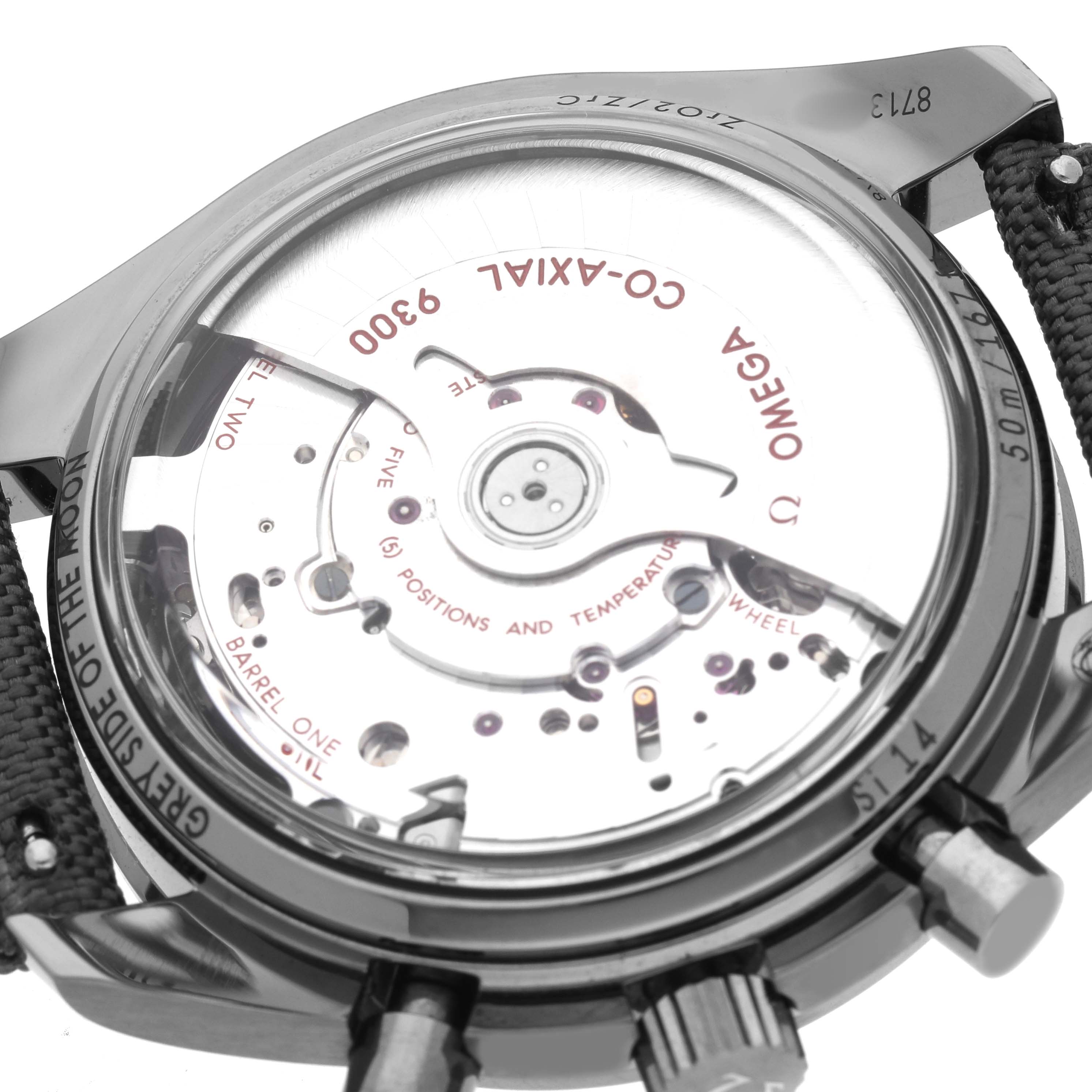 This Omega Speedmaster 311.93.44.51.99.002 Men's Ceramic Silver Dial watch is shown from the back, displaying its movement and inner mechanics.