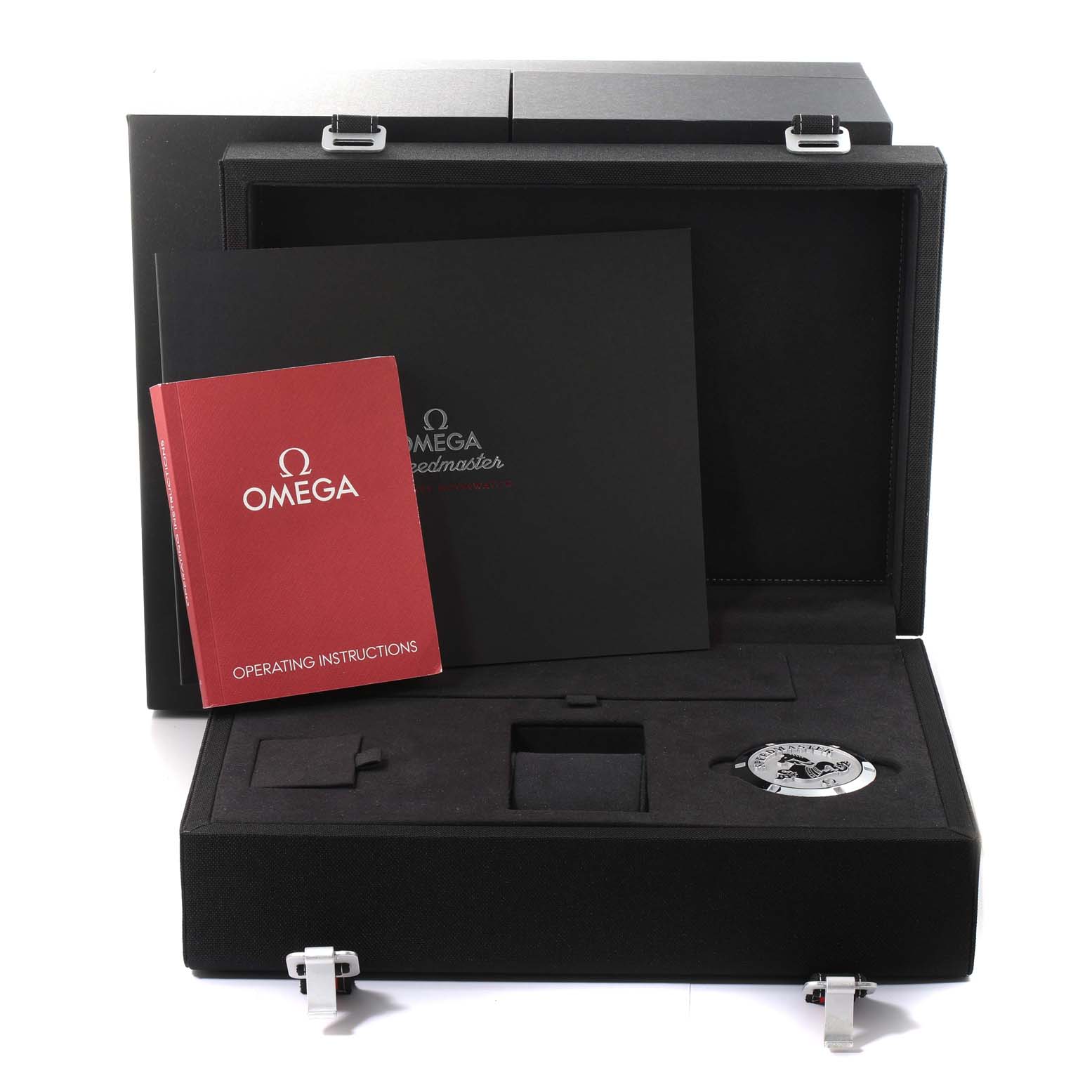 The image shows an Omega Speedmaster 310.30.42.50.01.001 Men's Stainless Steel Black Dial 310.30.42.50.01.001 Men's Stainless Steel Black Dial watch box opened, revealing the operating instructions, various compartments, and accessories.