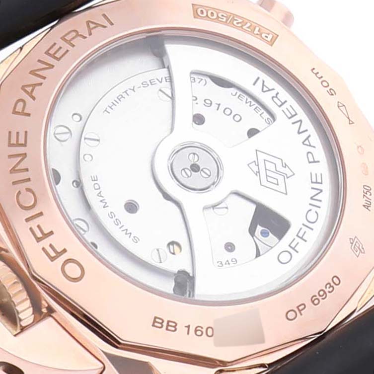 The image shows a close-up of the back case and movement of a Panerai Luminor PAM00525 Men's Rose Gold Black Dial PAM00525 Men's Rose Gold Black Dial watch.