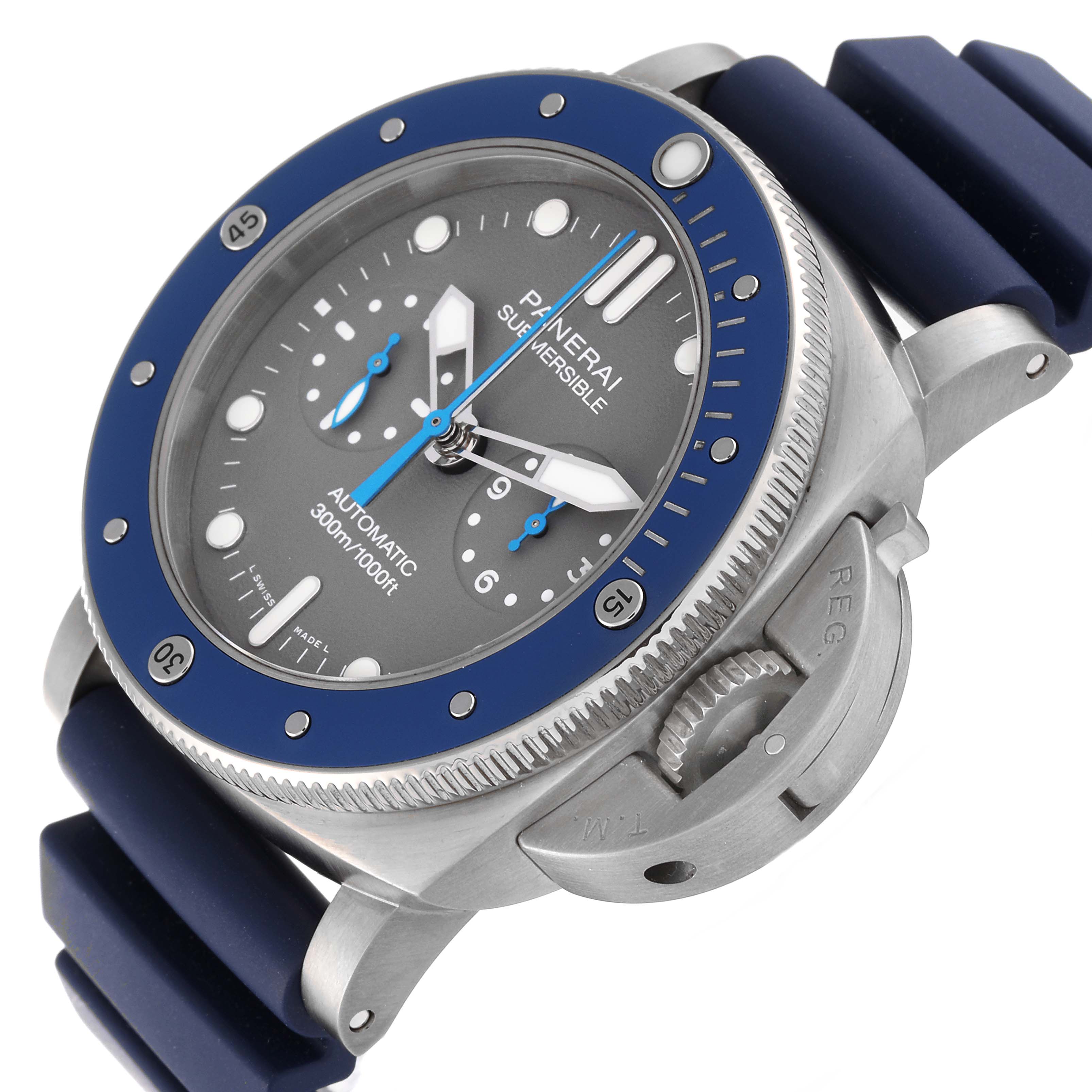The image shows a Panerai Submersible PAM00982 Men's Titanium Grey Dial PAM00982 Men's Titanium Grey Dial watch from a tilted front angle, highlighting the bezel, dial, crown guard, and blue rubber strap.