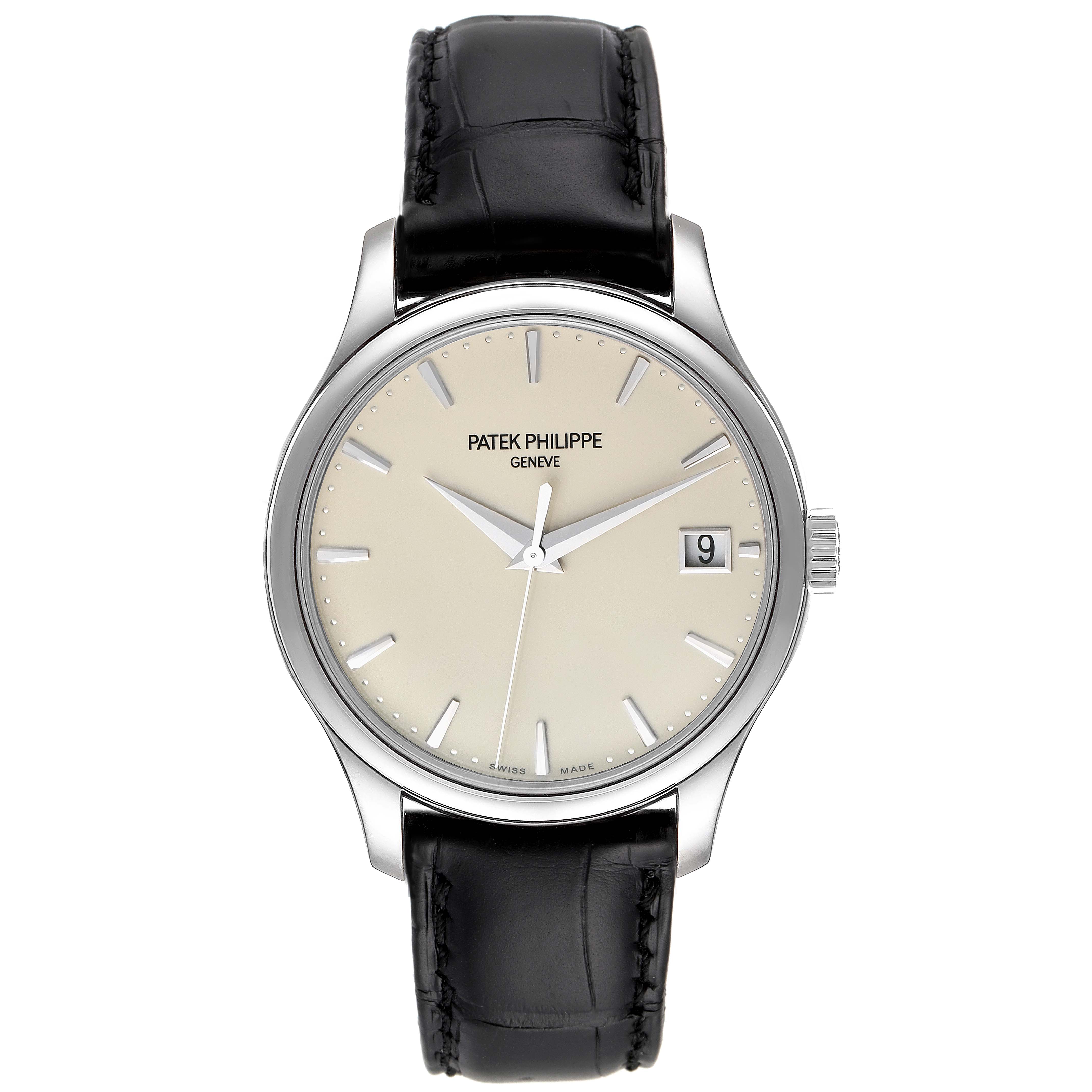 The image shows a front view of the Patek Philippe Calatrava 5227G Men's White Gold Silver Dial 5227G Men's White Gold Silver Dial watch with a black leather strap and cream dial.