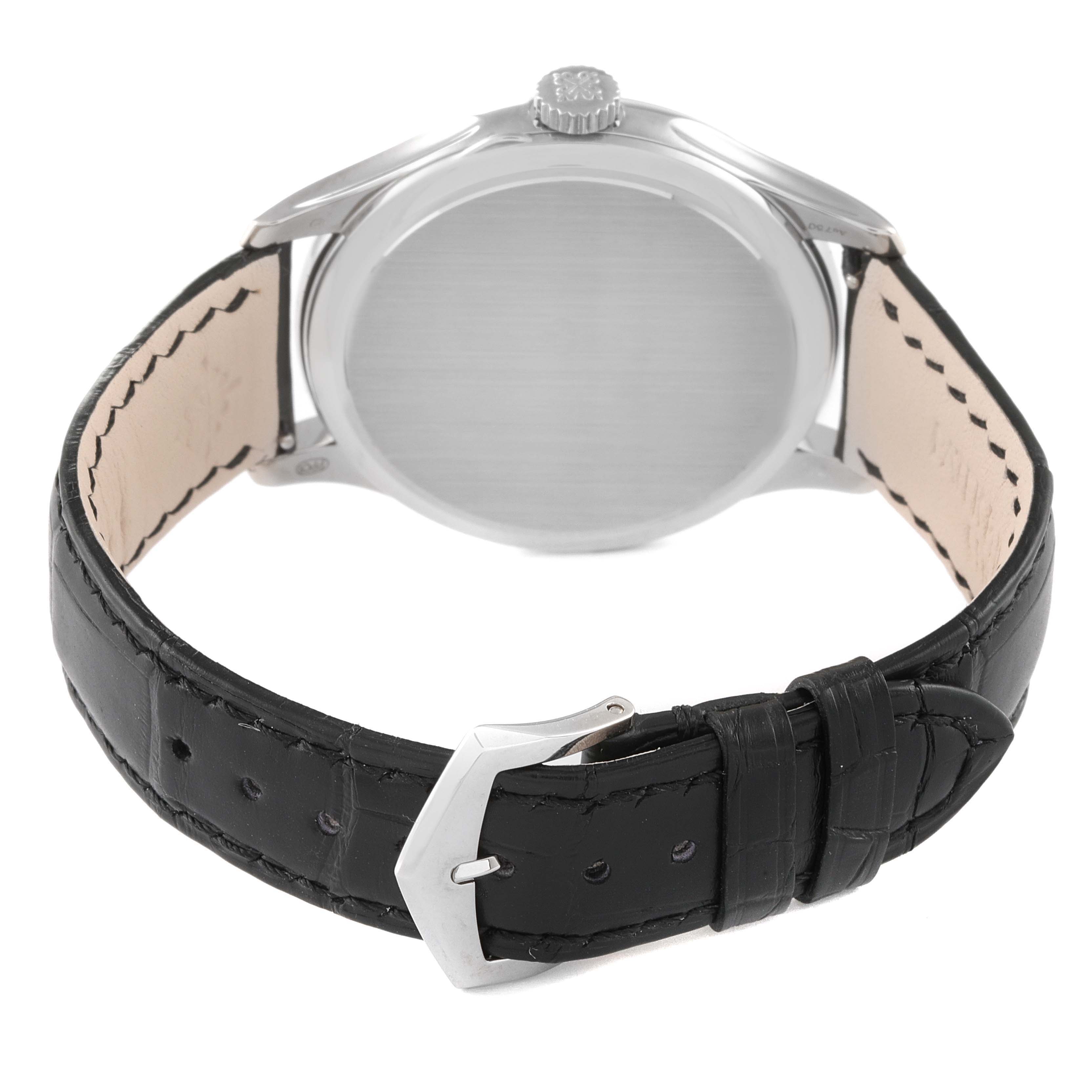 The image shows the back view of a Patek Philippe Calatrava 5227G Men's White Gold Silver Dial 5227G Men's White Gold Silver Dial watch, highlighting the case back, crown, and leather strap with its buckle.
