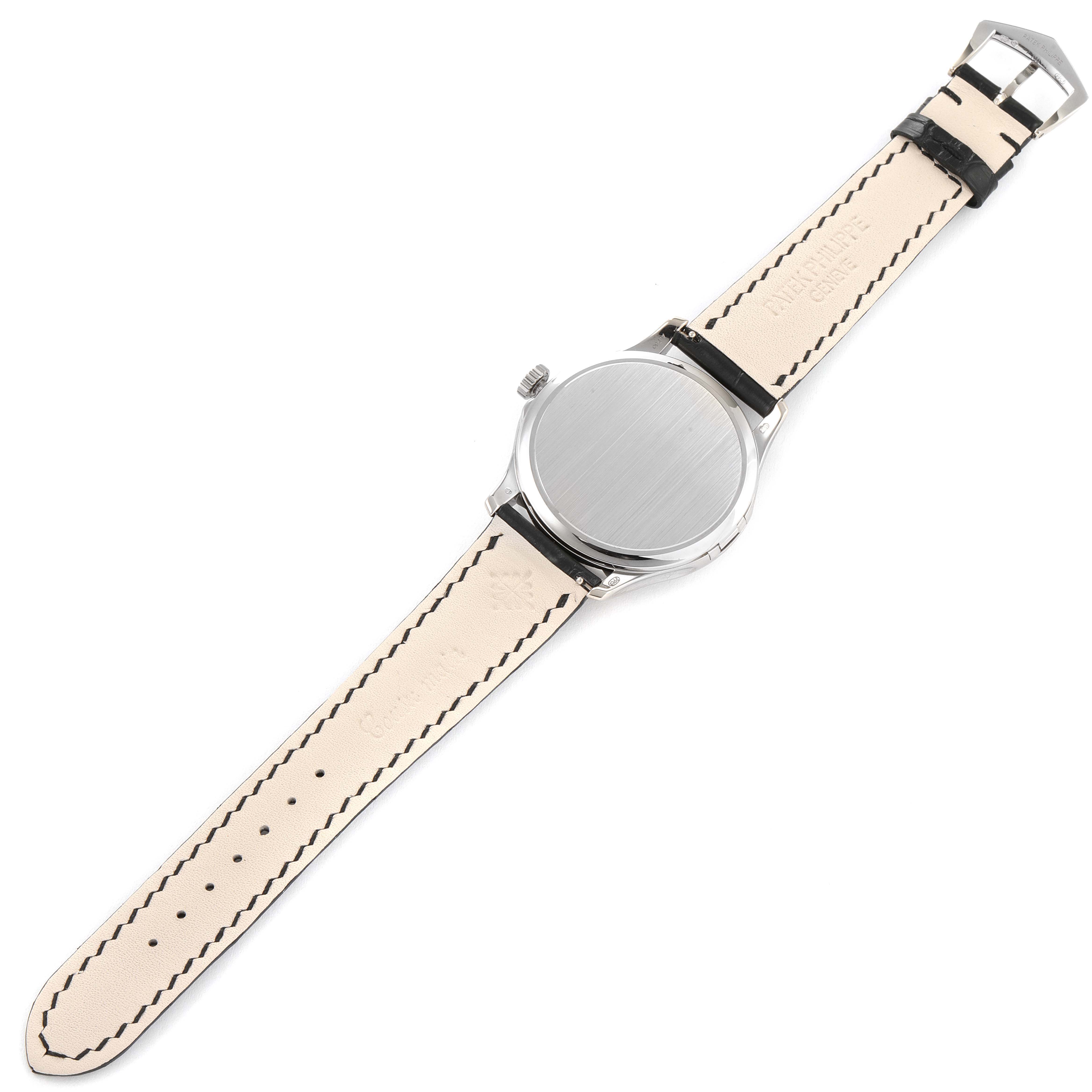 The image shows the back view of a Patek Philippe Calatrava 5227G Men's White Gold Silver Dial 5227G Men's White Gold Silver Dial watch, displaying its case back and full leather strap.