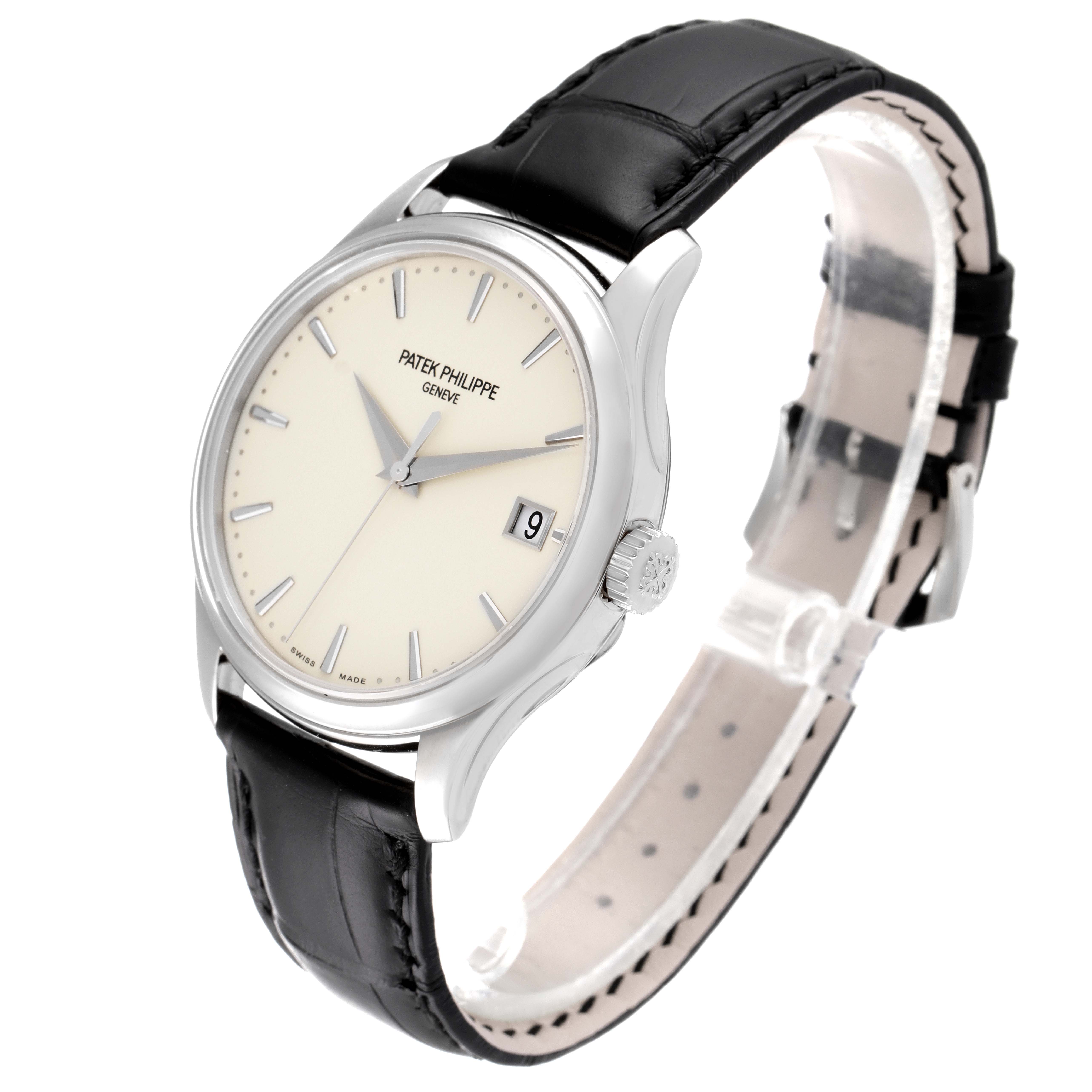 This image shows a Patek Philippe Calatrava 5227G Men's White Gold Silver Dial 5227G Men's White Gold Silver Dial watch from a front angle, highlighting the dial, case, crown, and leather strap.