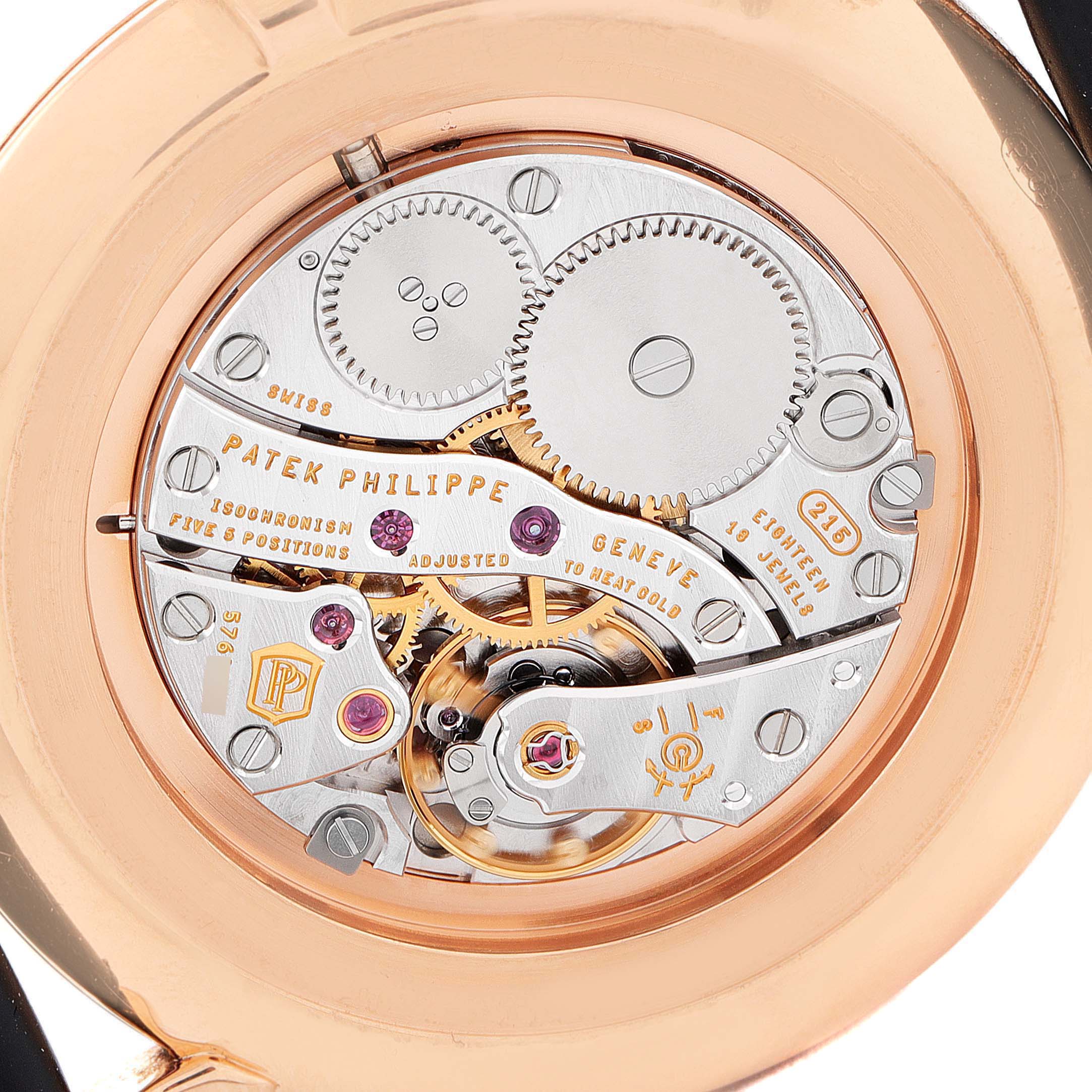 This image shows the intricate movement and inner workings of a Patek Philippe Calatrava 5119R Men's Rose Gold White Dial 5119R Men's Rose Gold White Dial watch from the back.