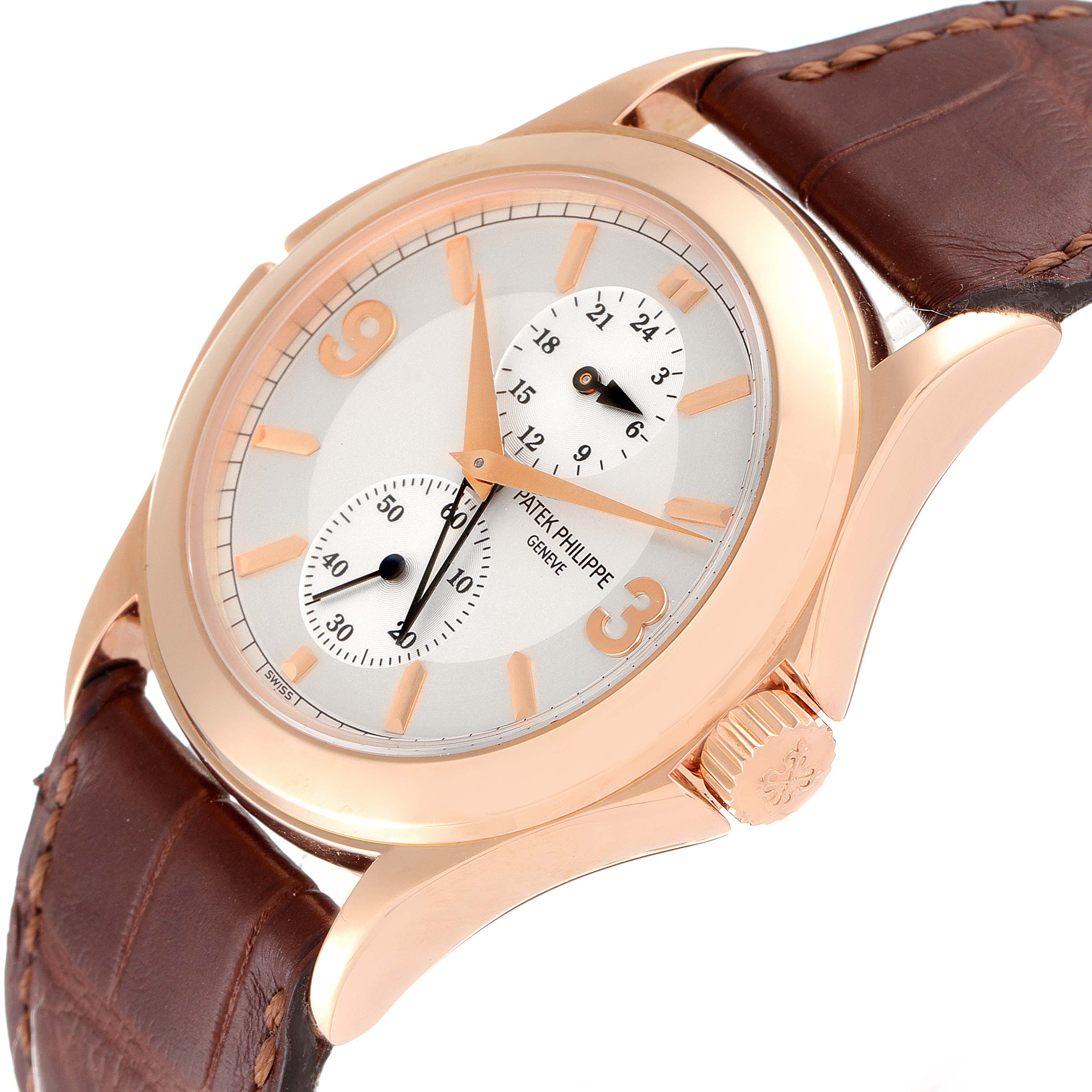 The image shows a Patek Philippe Calatrava 5134R Men's Rose Gold Silver Dial 5134R Men's Rose Gold Silver Dial watch at an angled side view, highlighting the dial, crown, and brown leather strap.