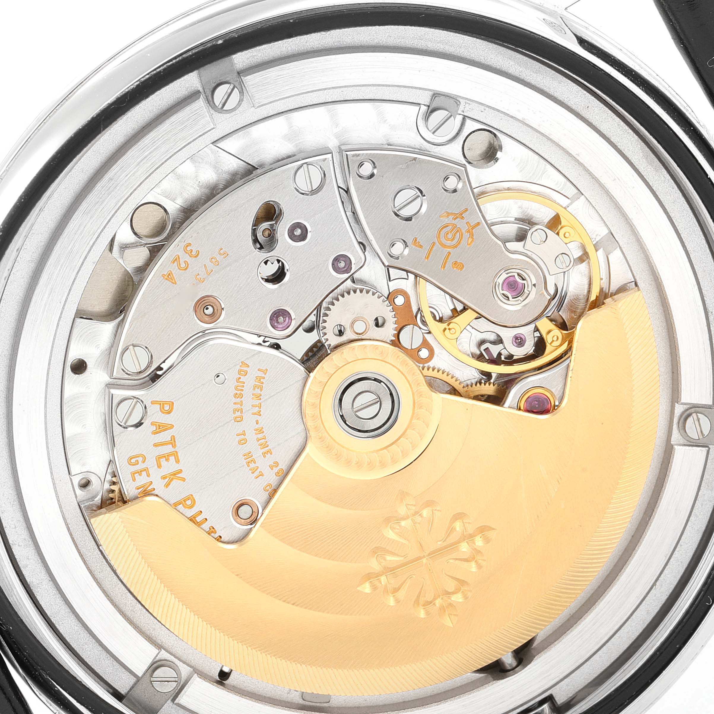 The image shows the back view of a Patek Philippe Calatrava 5297G Men's White Gold Black Dial 5297G Men's White Gold Black Dial watch, revealing its intricate mechanical movement.