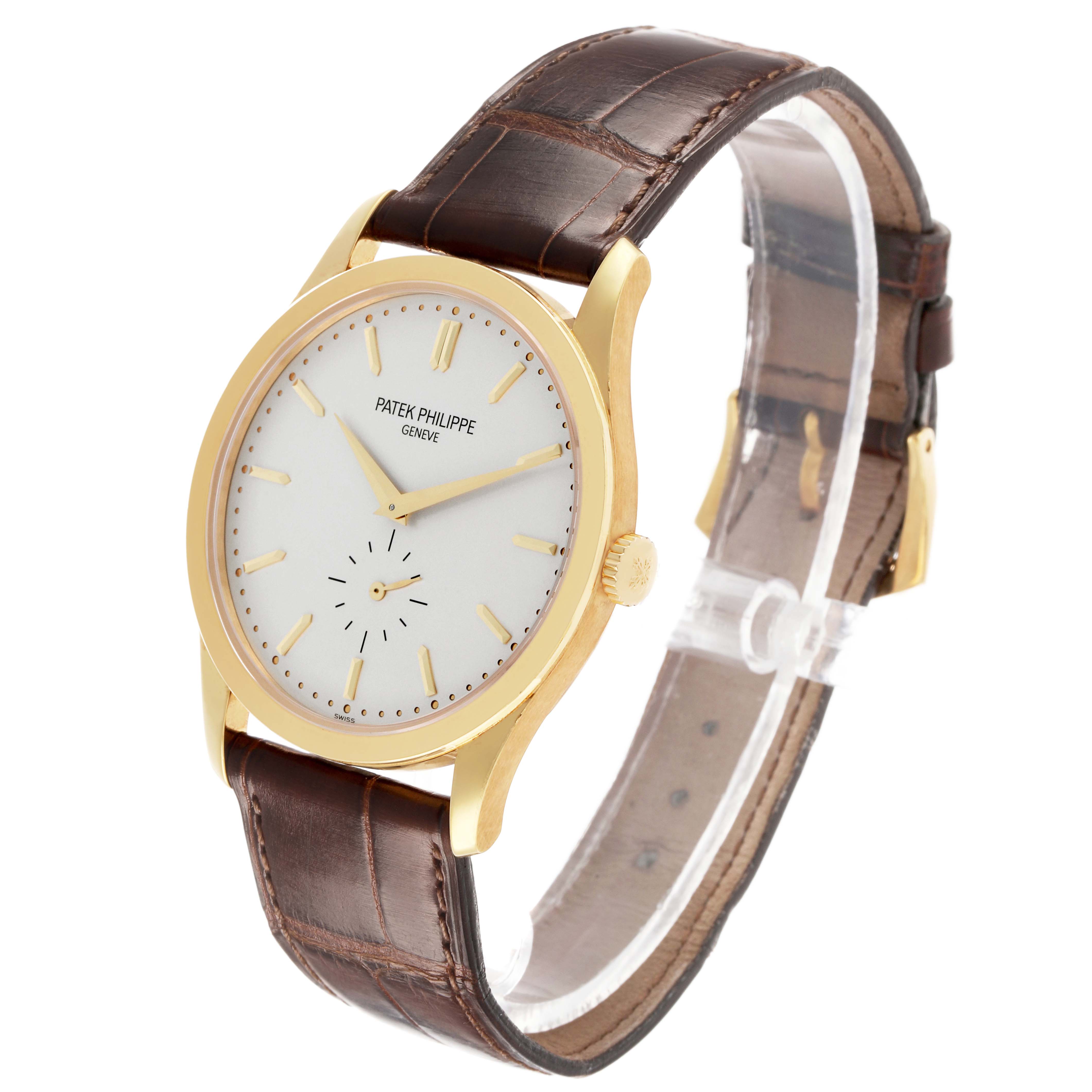 The image shows a Patek Philippe Calatrava 5196J Men's Yellow Gold Silver Dial watch at a slight angle, displaying the face, gold case, crown, and brown leather strap.