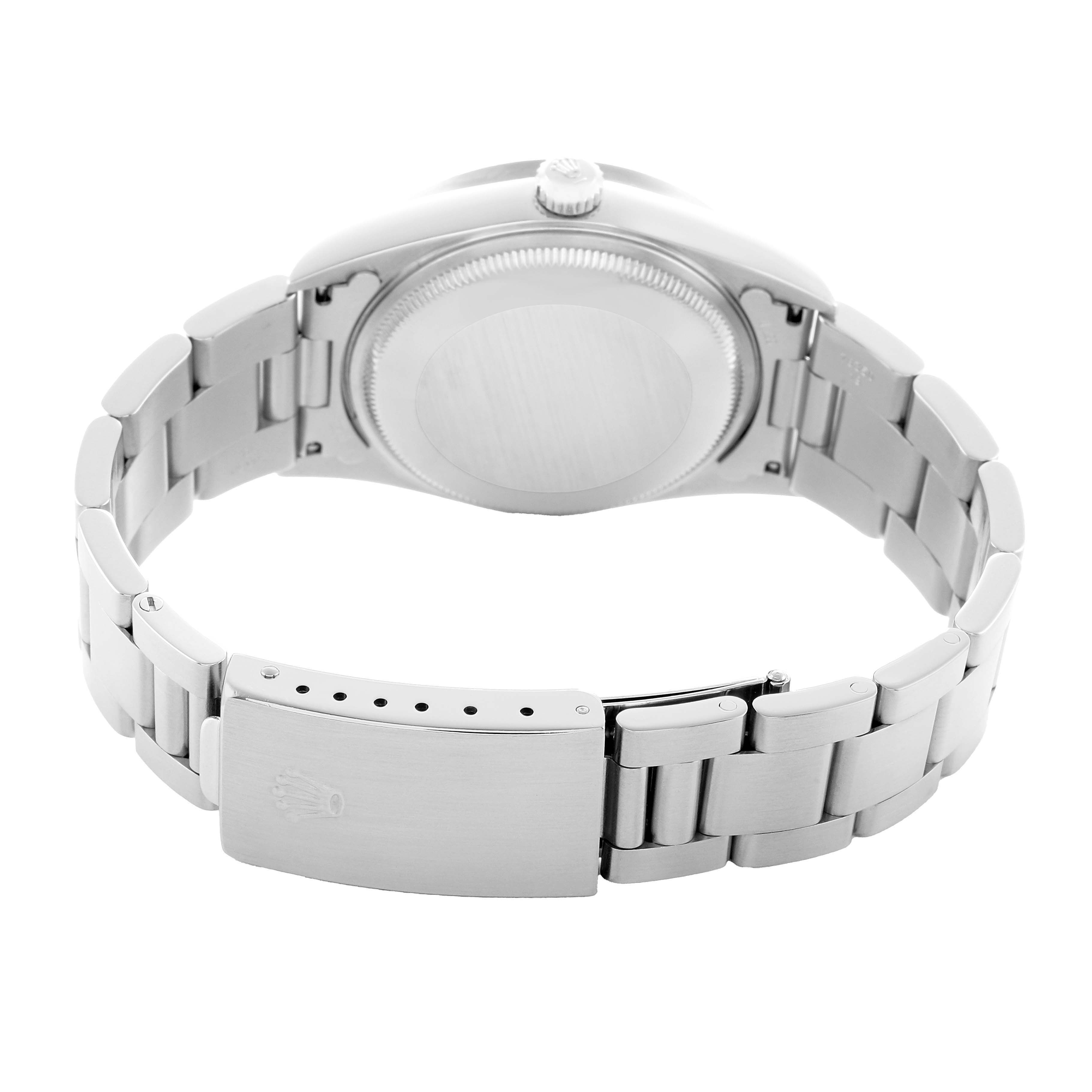 The Rolex Air-King 14010 Men's Stainless Steel White Dial watch is shown from the back, highlighting the clasp, bracelet, and case back.