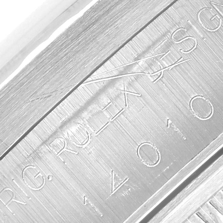 The image shows an engraved side detail of a Rolex Air-King 14010 Men's Stainless Steel White Dial 14010 Men's Stainless Steel White Dial watch.