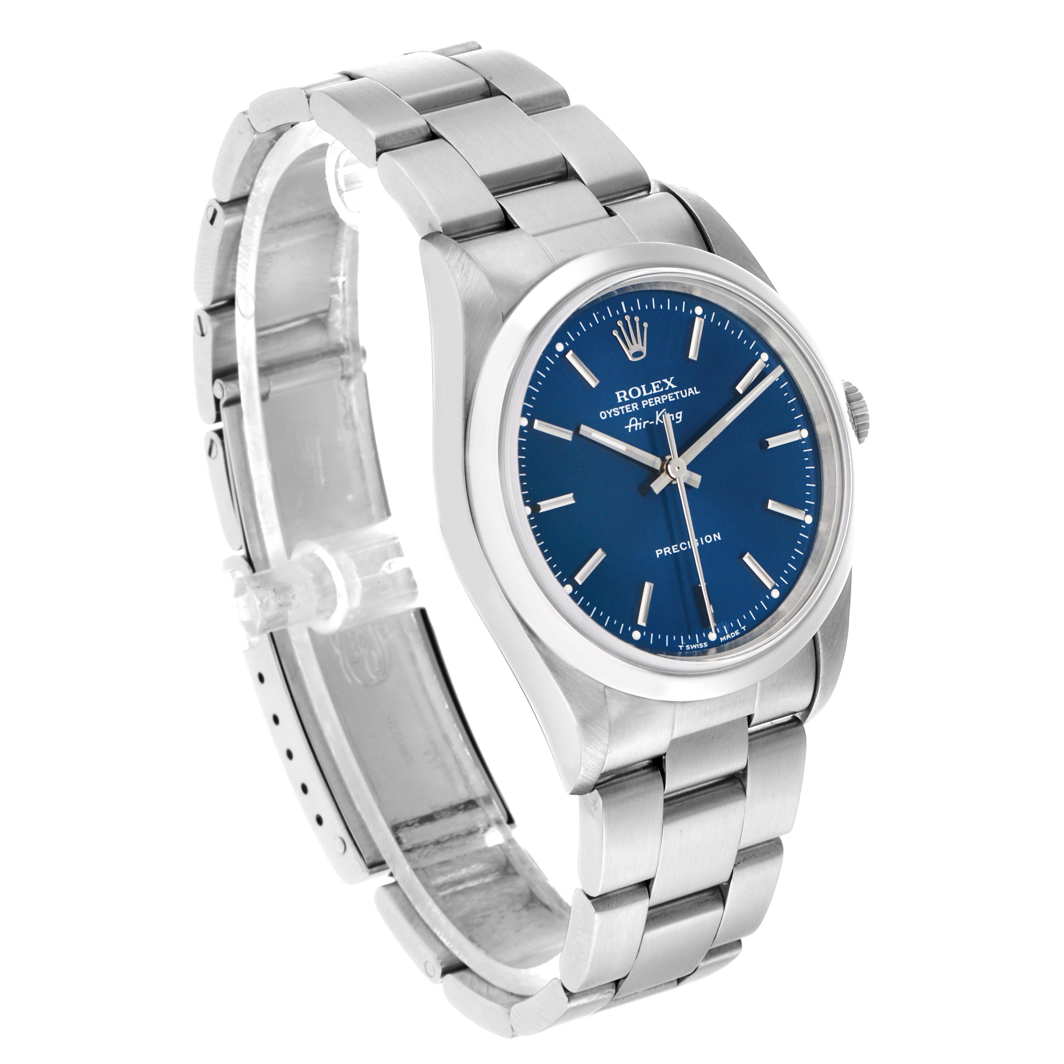 The image shows a Rolex Air-King 14000 Men's Stainless Steel Blue Dial watch at a three-quarter angle, highlighting the blue dial, stainless steel bracelet, and crown.