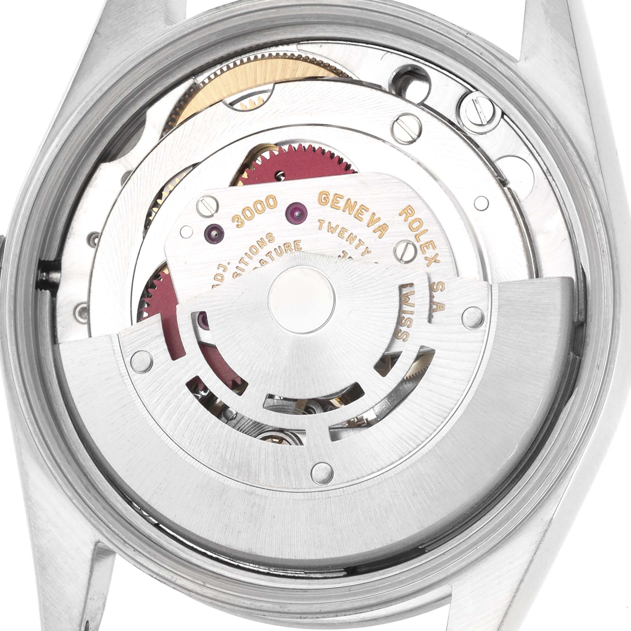 The image shows the movement of the Rolex Air-King 14000 Men's Stainless Steel Silver Dial watch from the back, revealing the rotor and gears.