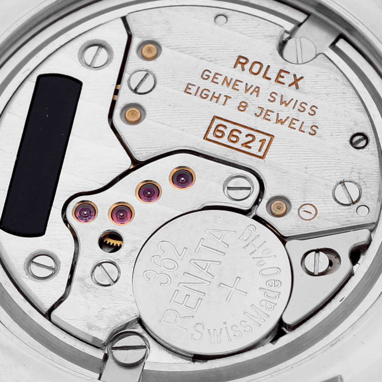 The image shows the internal movement components of the Rolex Cellini 6229 Women's White Gold White Dial 6229 Women's White Gold White Dial watch, highlighting jewels and the battery.