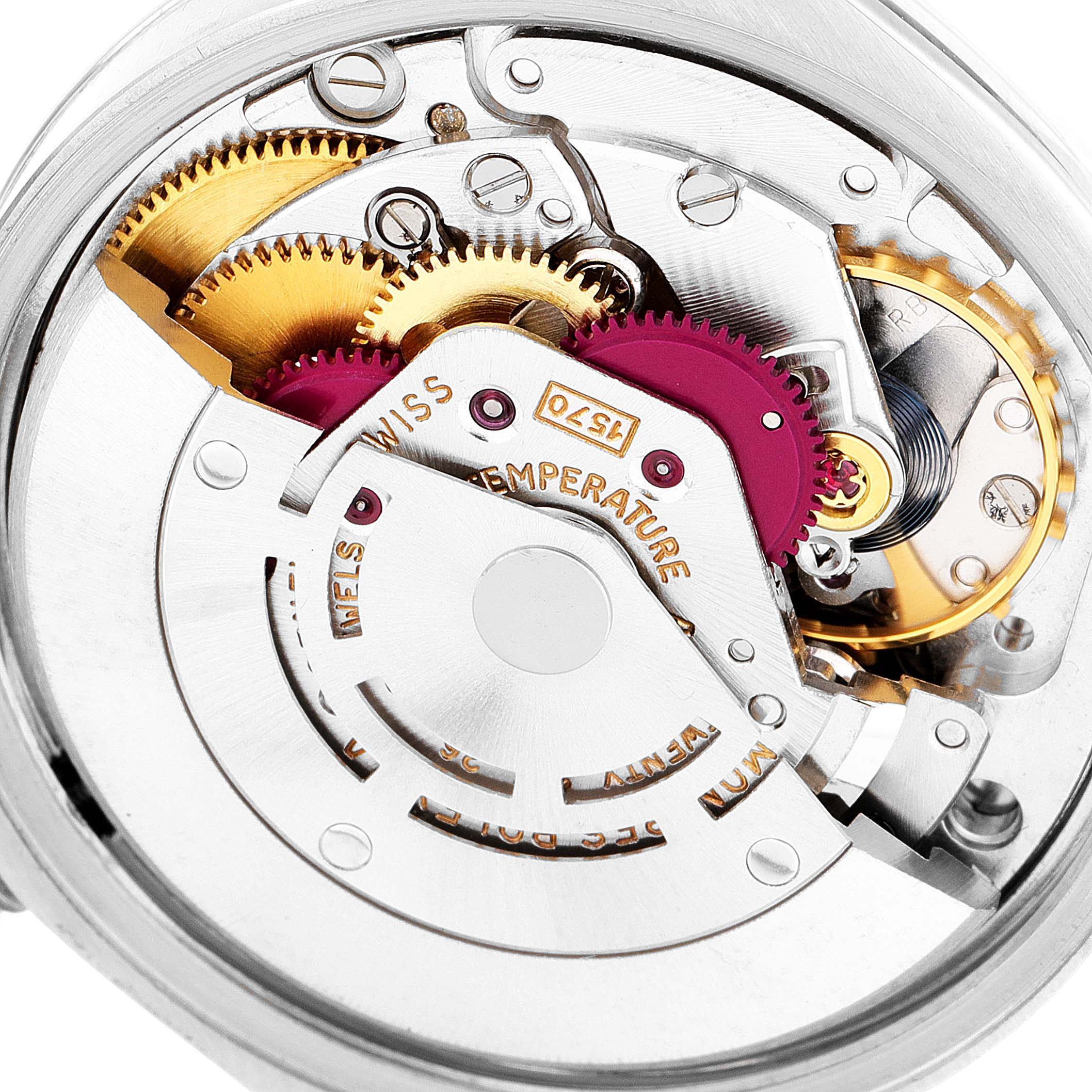 The image shows the intricate internal mechanism of a Rolex Vintage Collection 1500 Men's Stainless Steel Silver Dial 1500 Men's Stainless Steel Silver Dial watch from the backside.