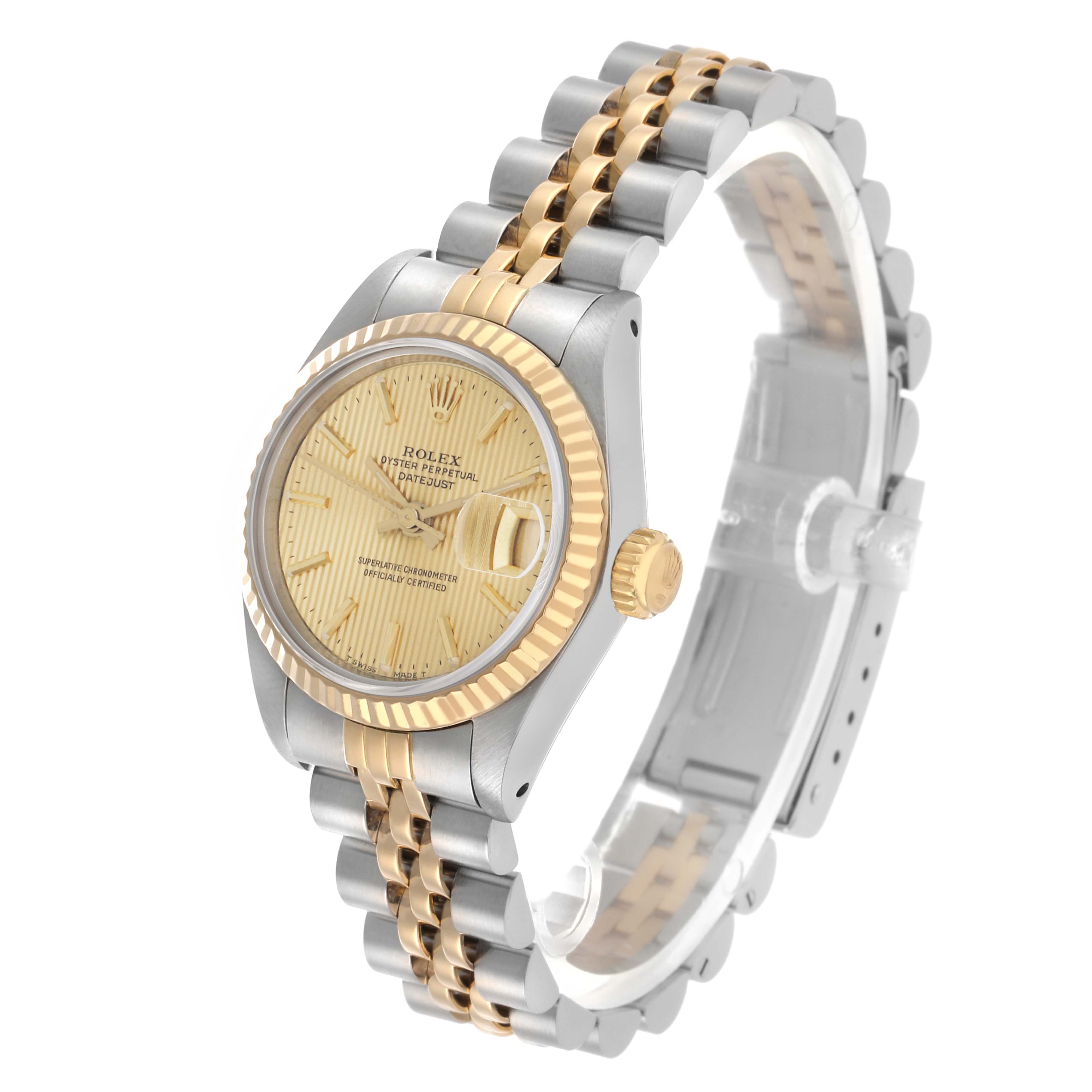 The Rolex Datejust 69173 Women's Steel and Gold (two tone) Champagne Dial watch is shown at a slight angle, highlighting the face, fluted bezel, two-tone bracelet, and crown.