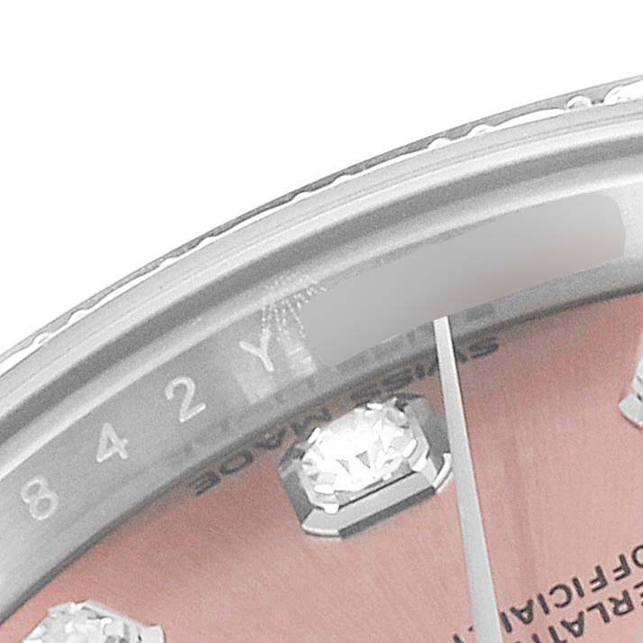 This image shows a close-up of the dial and indices, including some diamond marker details on a Rolex Datejust 279384 Women
s Stainless Steel Pink Dial 279384 Women
s Stainless Steel Pink Dial watch.